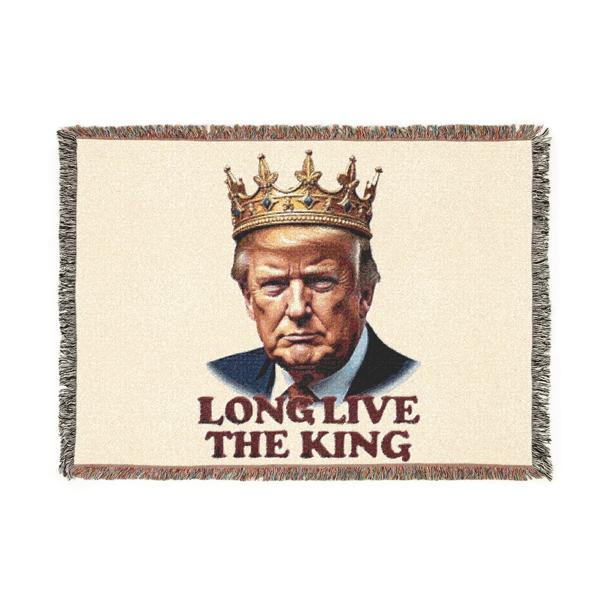 Front view of cream woven blanket with crowned Trump portrait, gold crown, blue suit details, 'LONG LIVE THE KING' text, colorful fringed edges