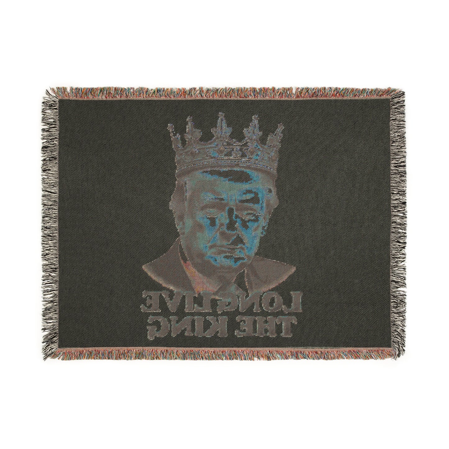 Reverse view dark fabric woven blanket, glitchy cyan crowned Trump portrait, flipped 'LONG LIVE THE KING' lettering, vibrant fringe