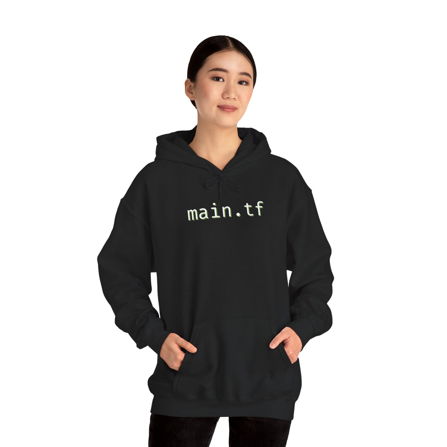 Angled fold of black hoodie showing glowing "main.tf" chest print