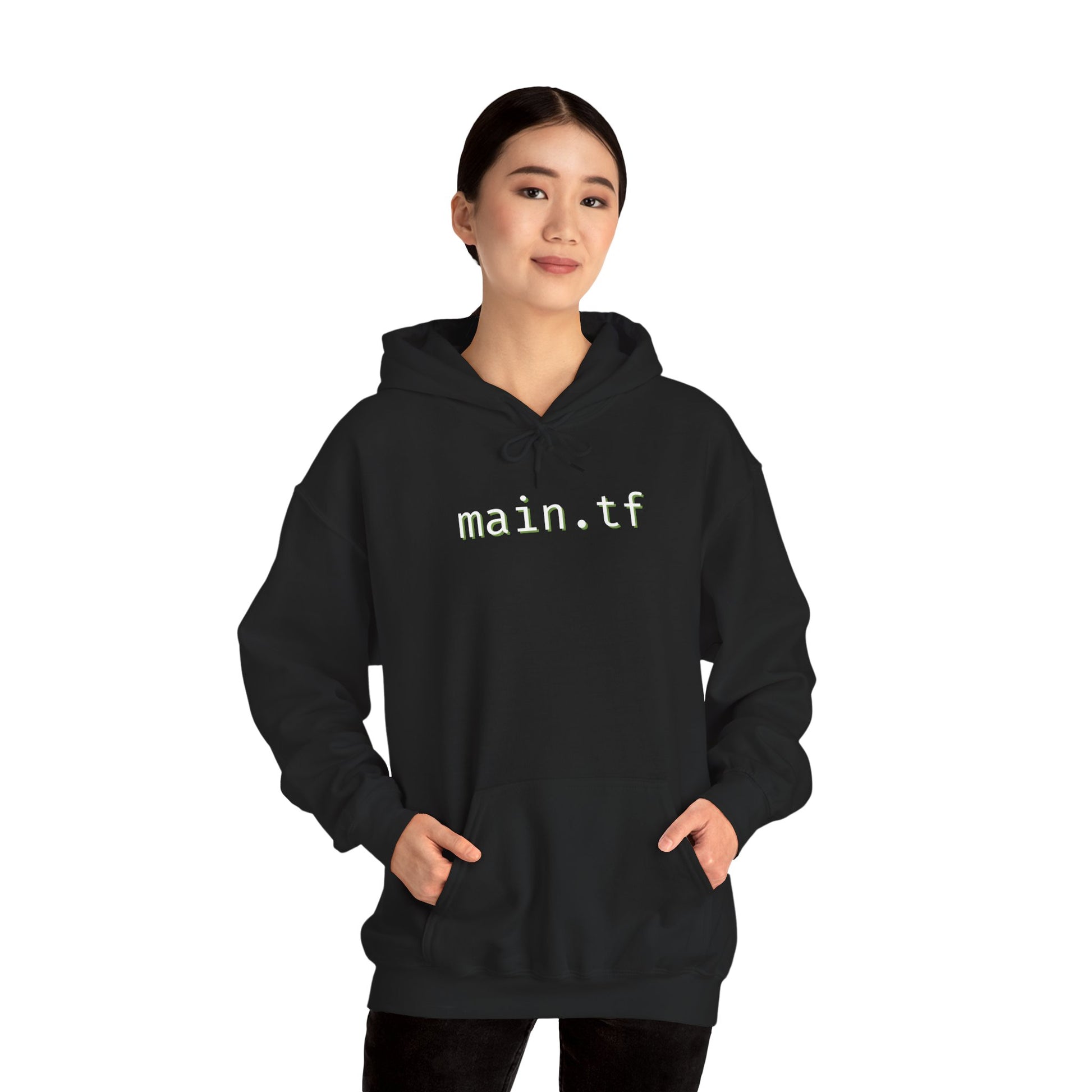 Angled fold of black hoodie showing glowing "main.tf" chest print