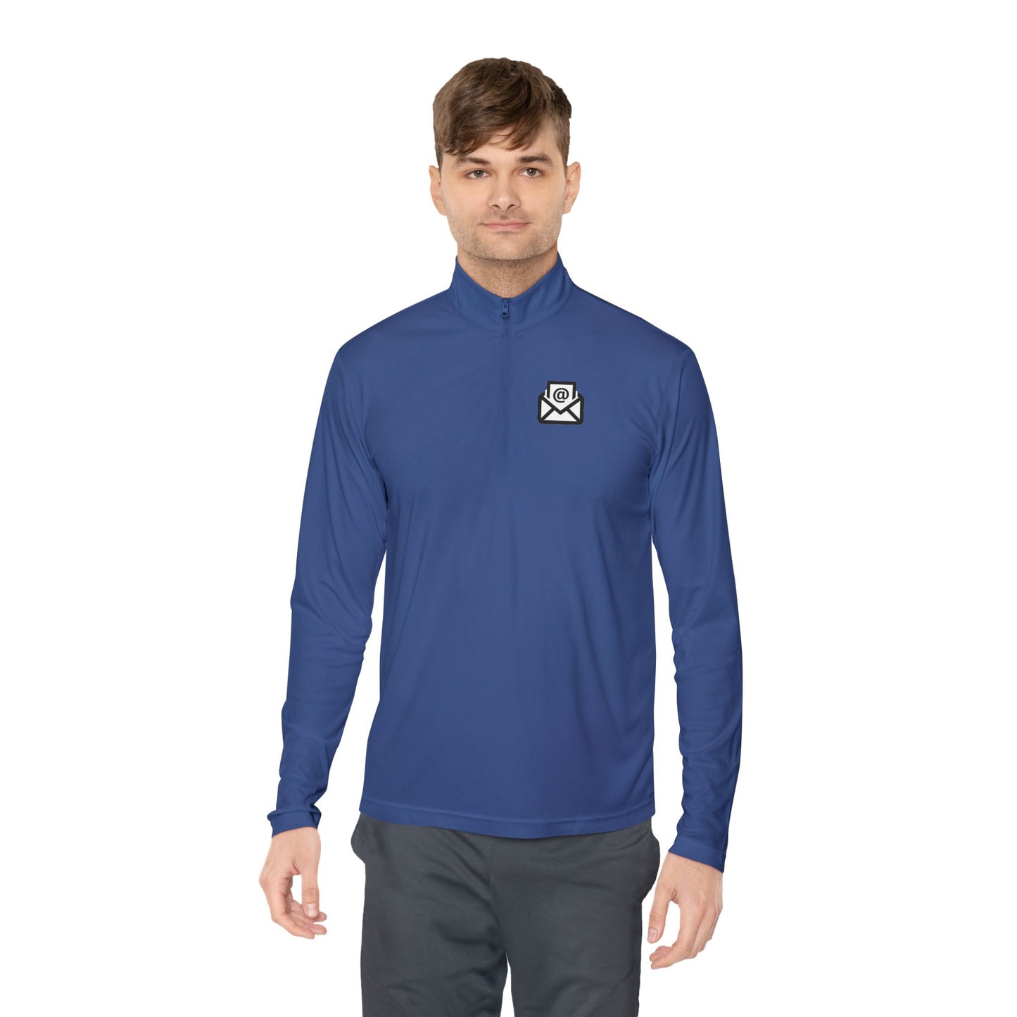 Man models navy quarter-zip pullover front view, white envelope detail left chest, grey pants