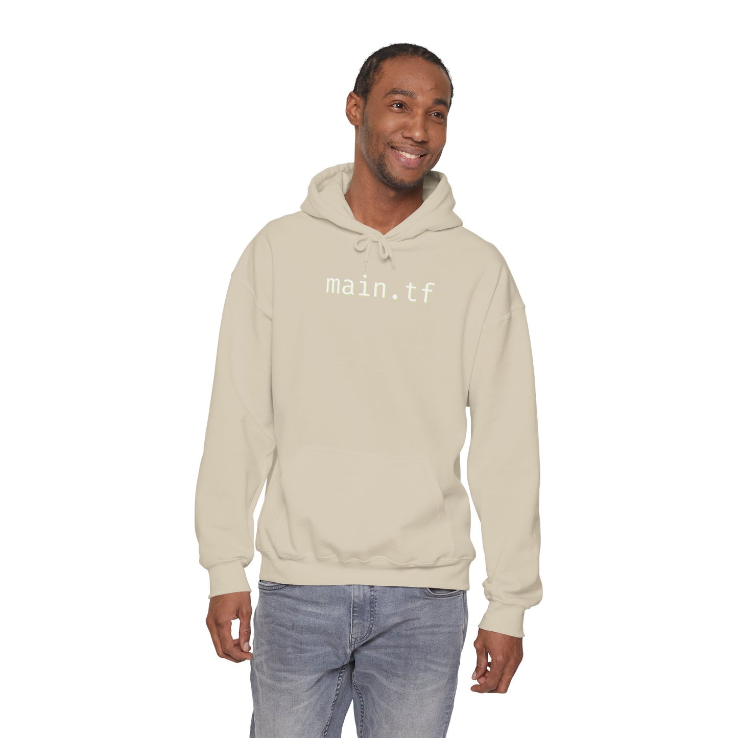 Smiling dude in light grey main.tf pullover hoodie, front angle with jeans – IaC ninja style