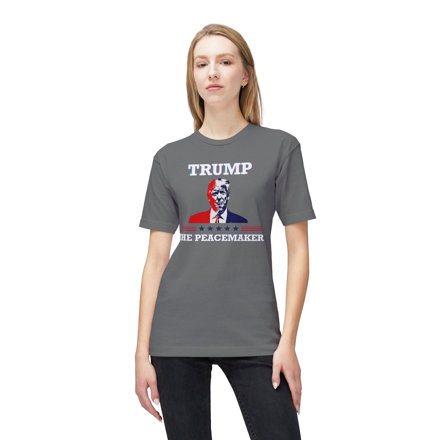 Blonde model in front view of charcoal gray tee with white "TRUMP", red-white-blue Trump portrait, "HE ★ PEACEMAKER" — irony alert