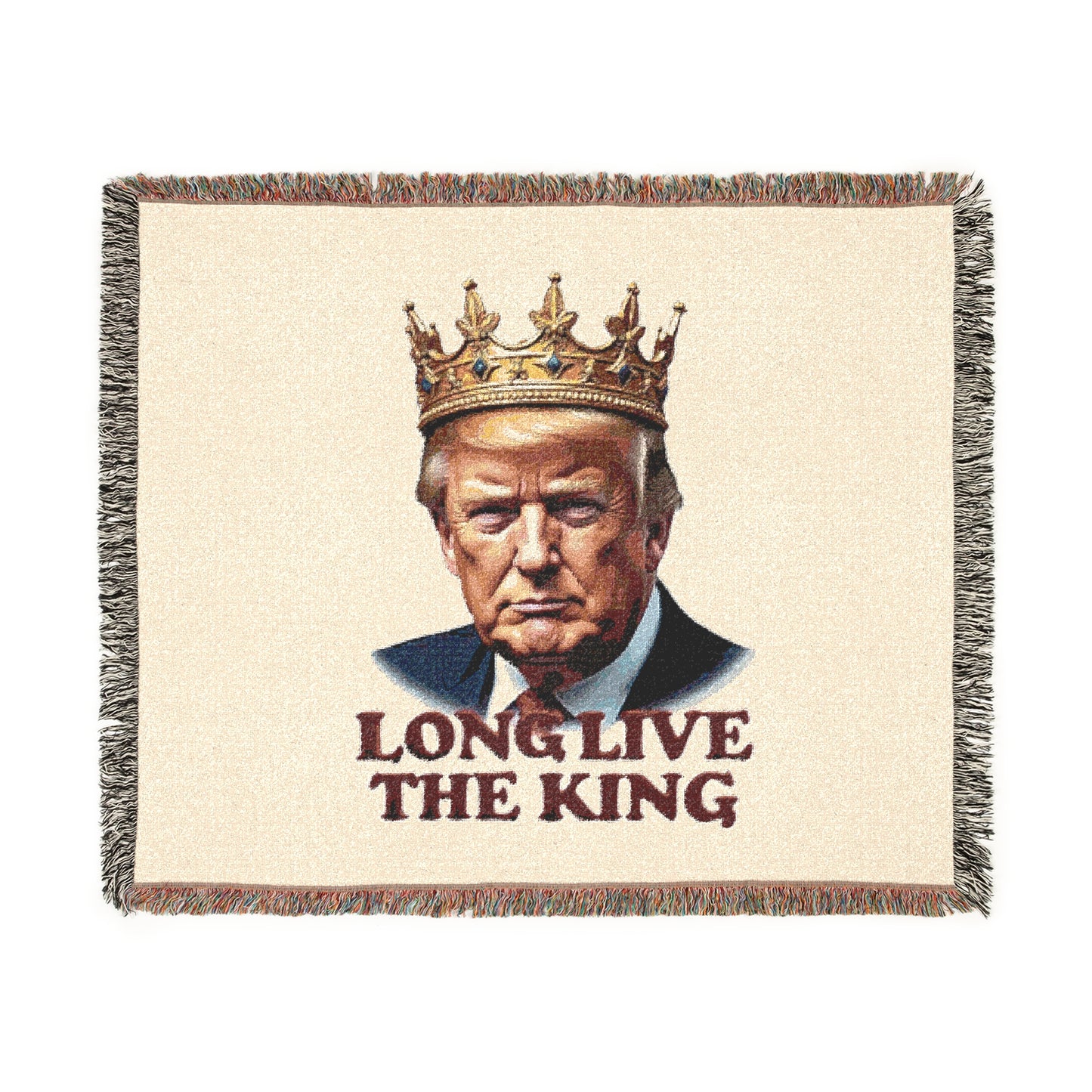Cream woven blanket front showing detailed Trump face under gold crown, 'LONG LIVE' arched above, 'THE KING' below, multicolored fringe