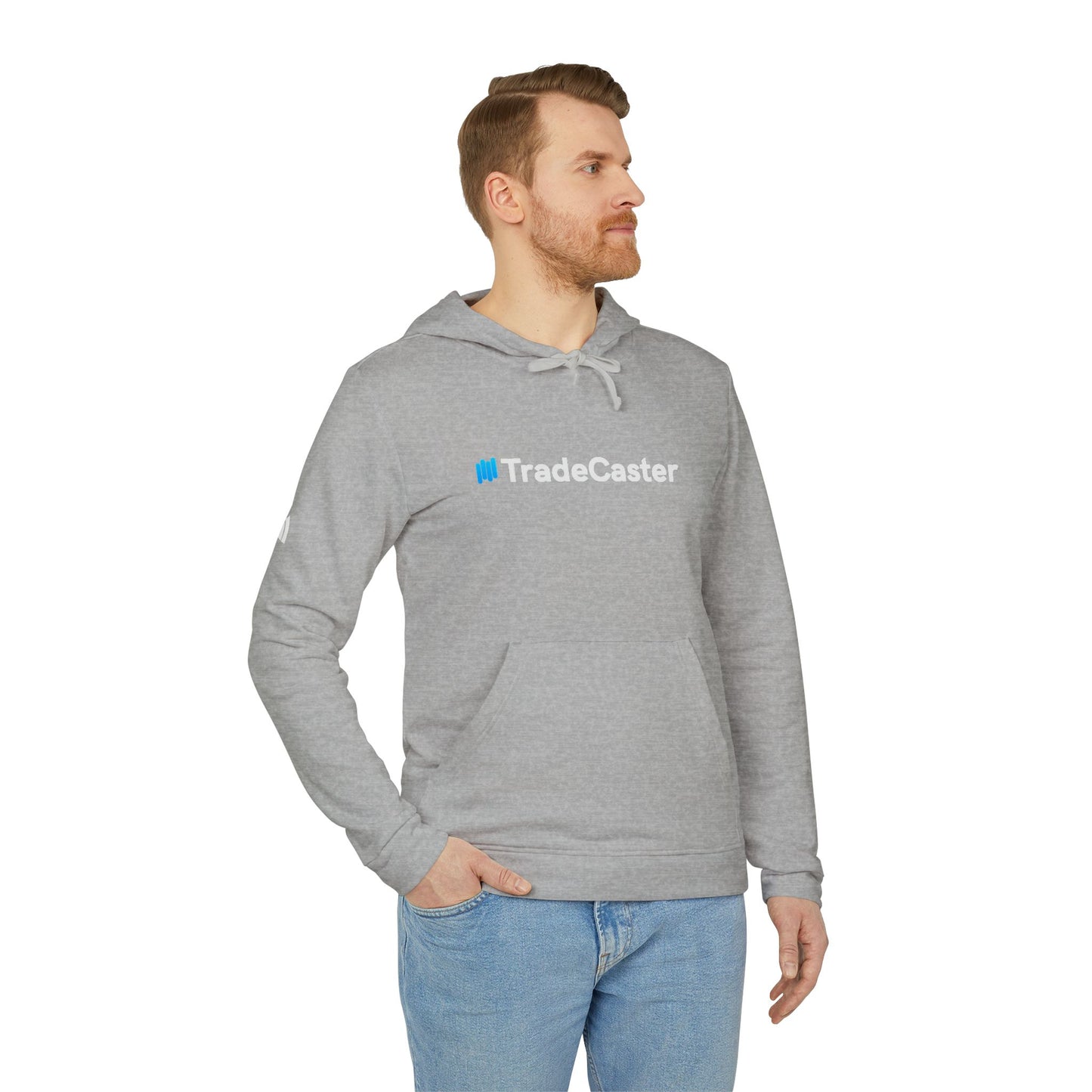 Man side view of grey heather TradeCaster Adidas hoodie, blue "Trade" accent logo, relaxed jeans fit