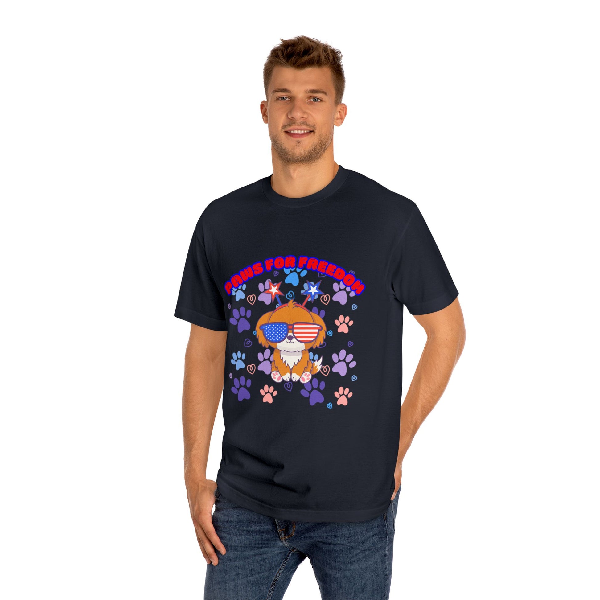 Guy rocking navy 'Paws for Freedom' tee front view, cartoon doggo with flag vibes & colorful paws