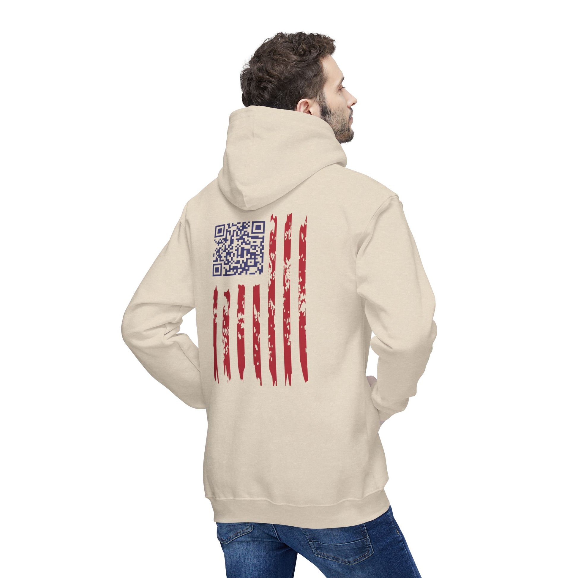 Man displaying back of cream hoodie: weathered US flag with integrated blue QR code