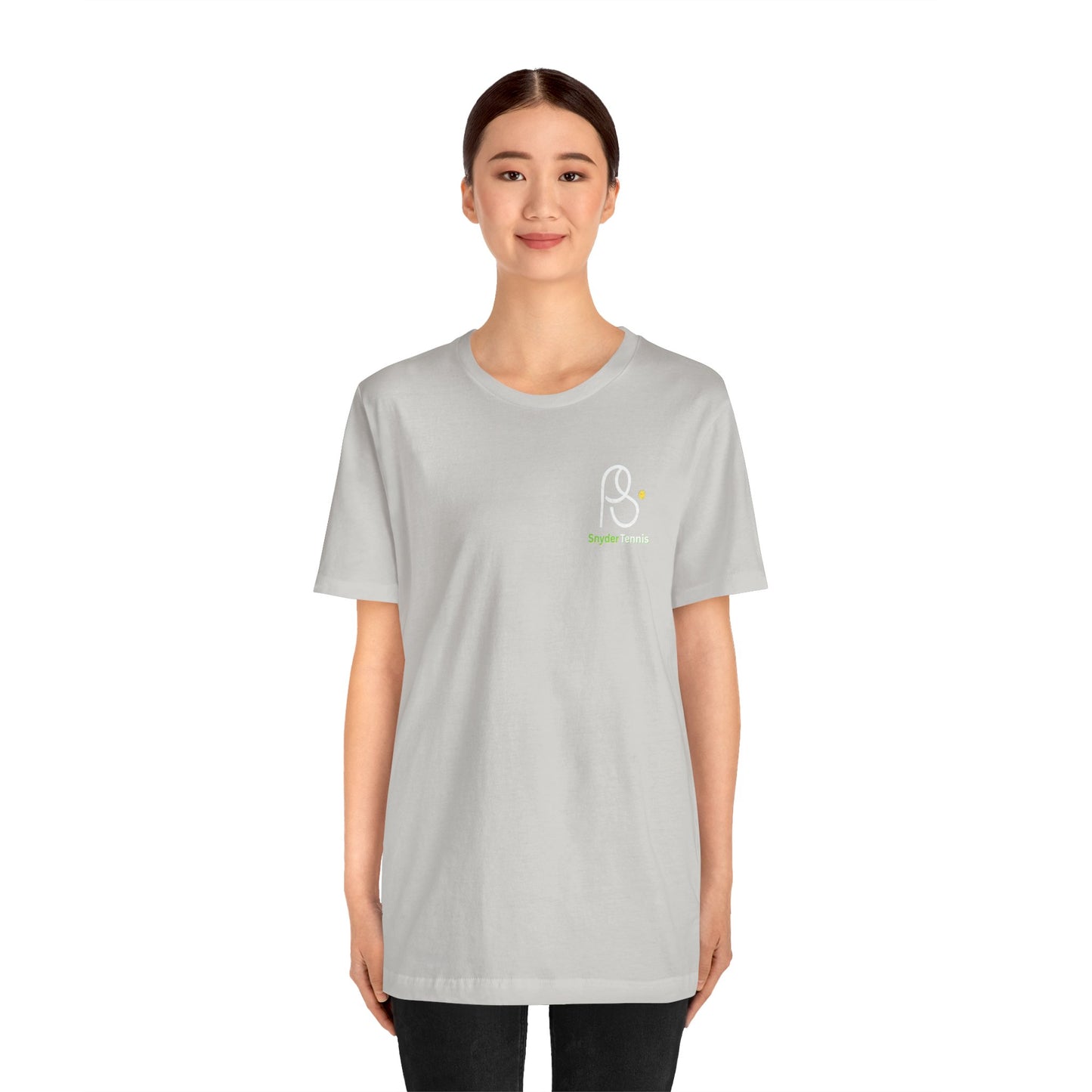 Female model front view in heather gray Coach Pete Snyder tennis tee showing PS logo, black pants