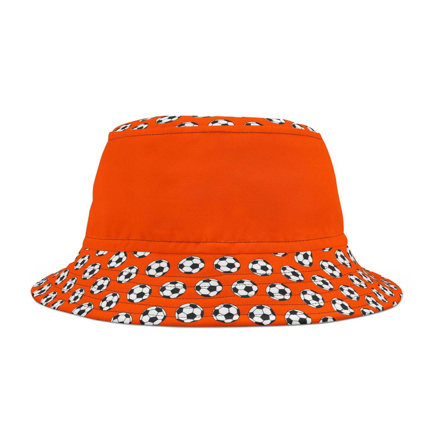 Flat lay orange bucket hat angled to show crown & wide brim of black & white soccer ball pattern