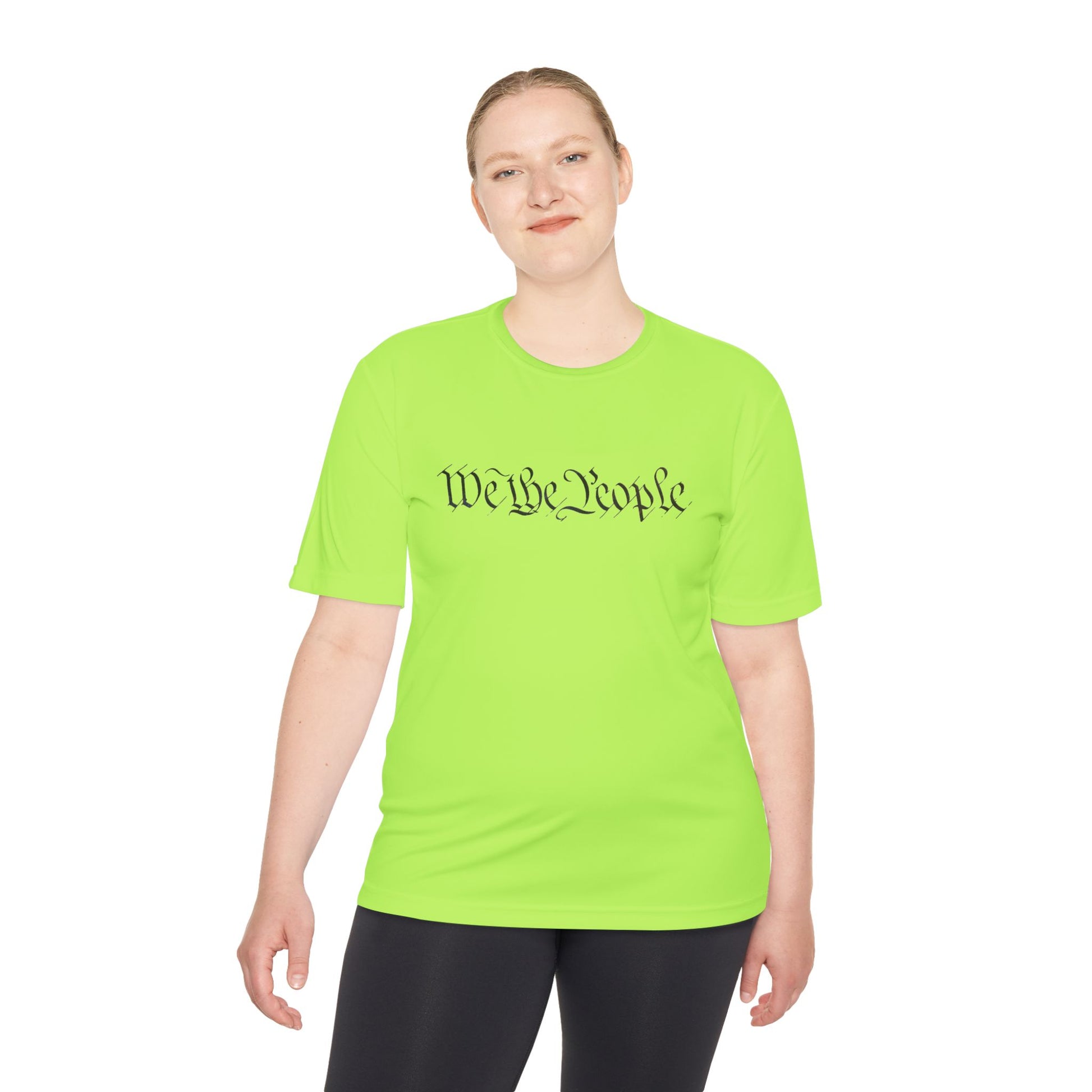 Woman modeling neon green "We the People" cursive tee like it's rally-ready