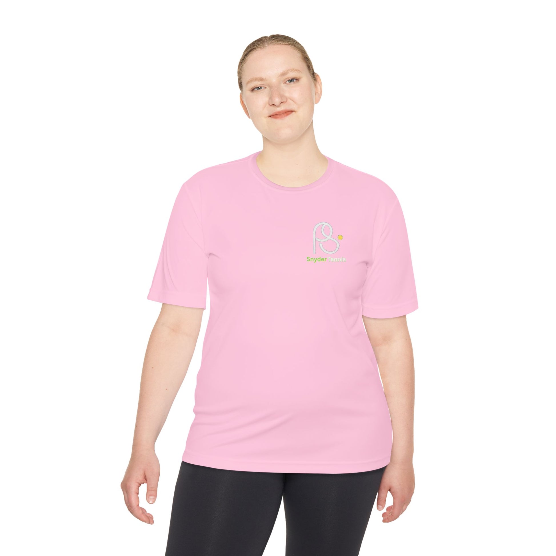 Smiling woman in front view of light pink short-sleeve tee featuring crisp white-outlined PS logo with yellow details on chest