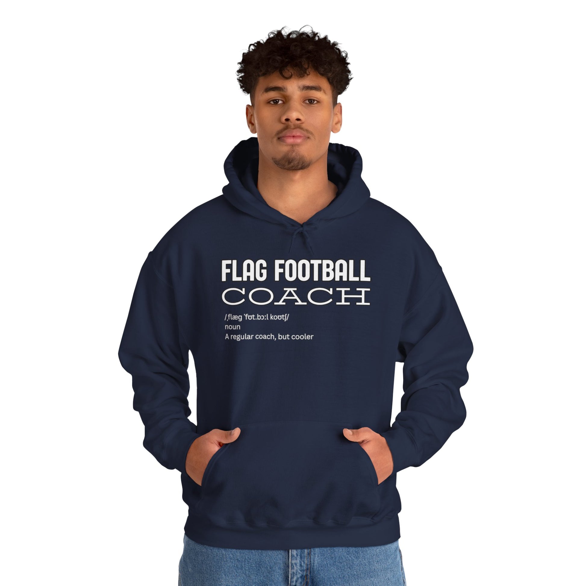 Curly-haired male model front view in navy "Flag Football Coach (flag foot coach): A regular coach, but cooler" hoodie