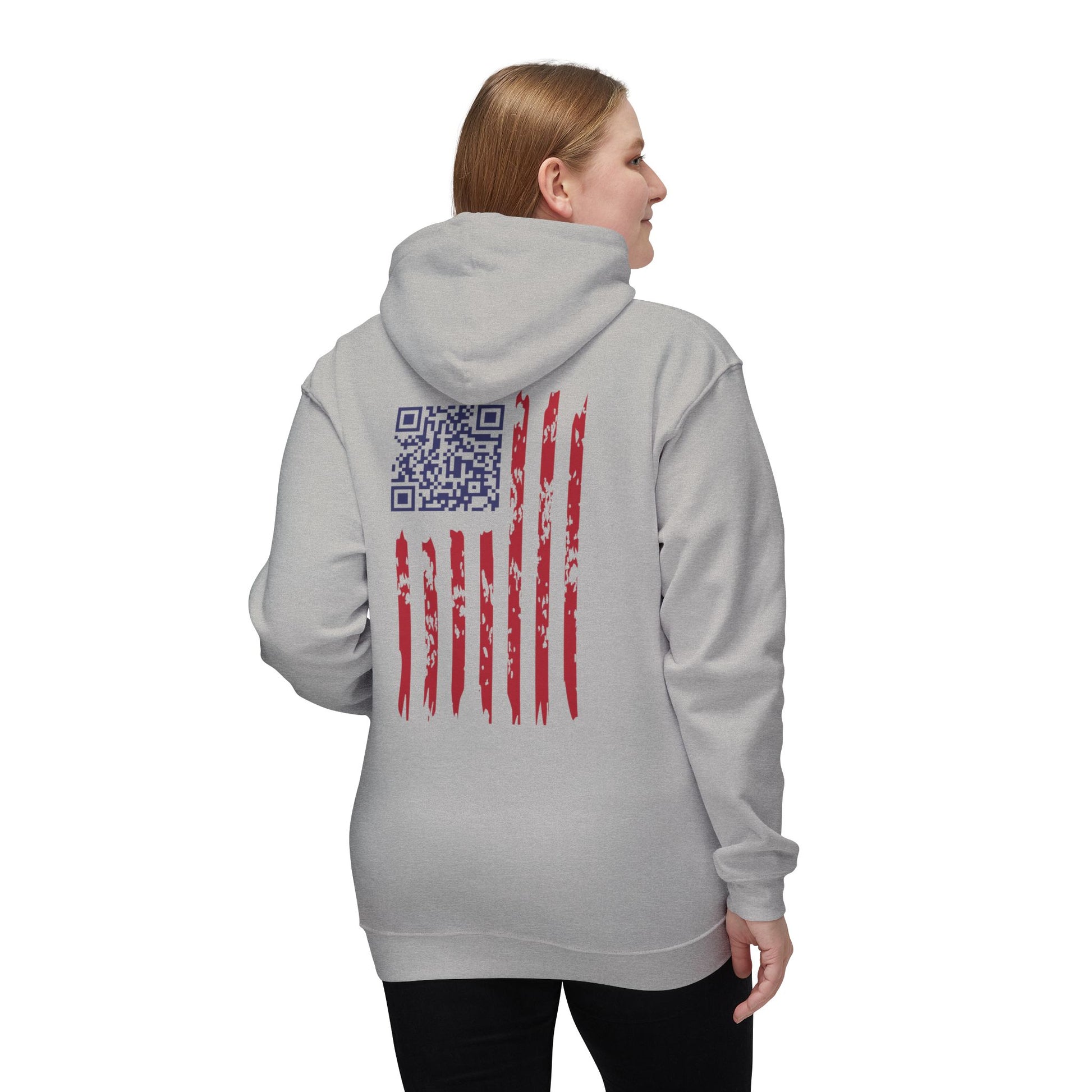 Woman modeling back of heather gray hoodie, distressed US flag with blue QR code for Trump dance