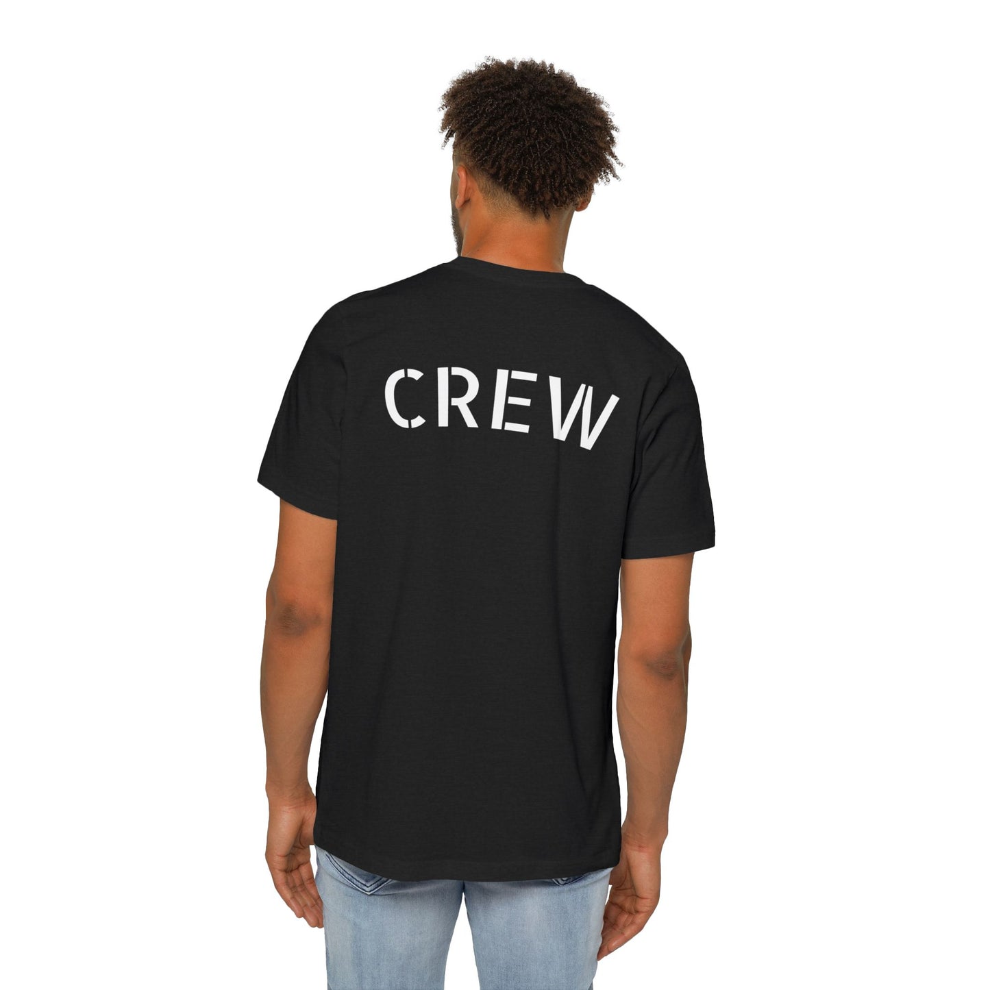 Rear view of male model wearing black crew t-shirt, white "CREW" across shoulders