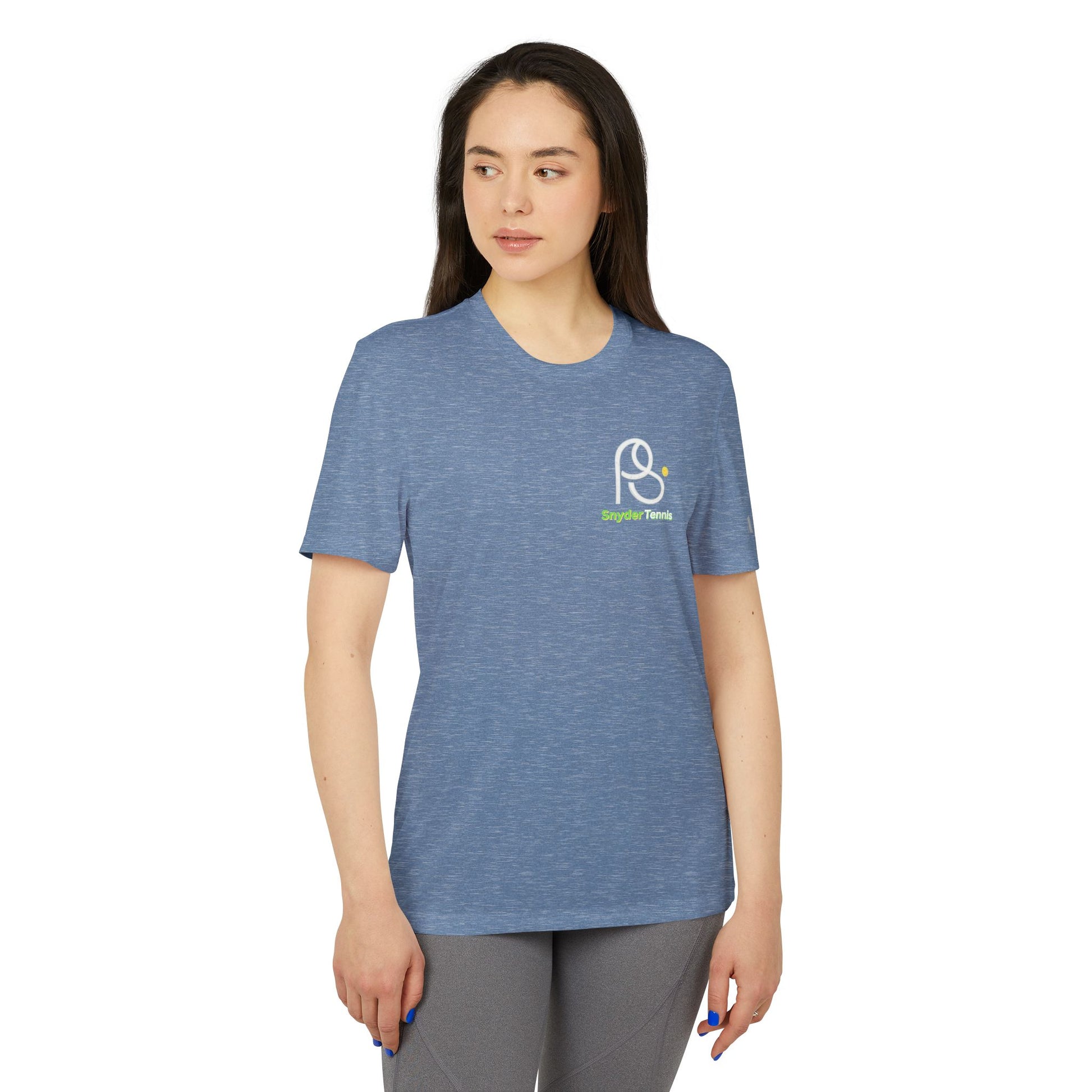 Front view female model in heather blue adidas Coach Pete Snyder T-shirt, left sleeve HT logo and green racket icon