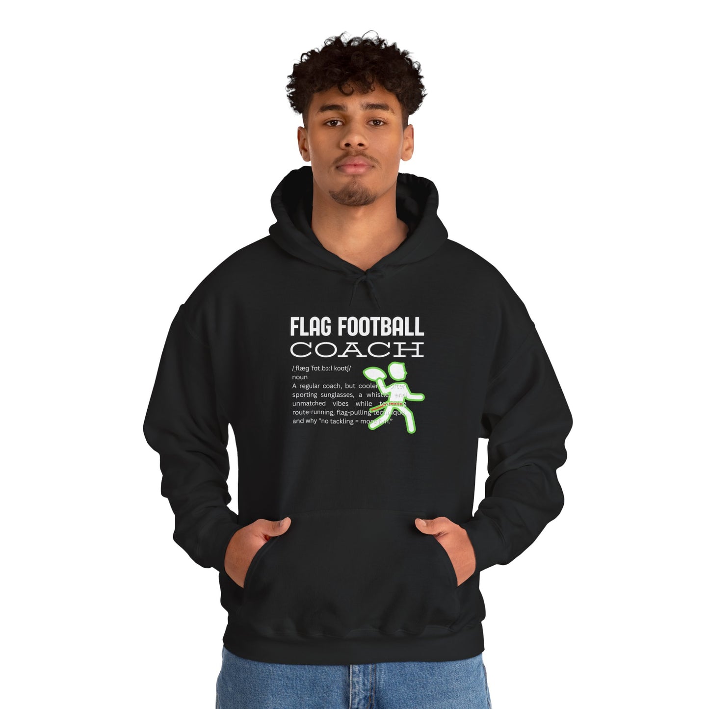 Curly-haired male model front view in black hoodie, "FLAG FOOTBALL COACH" white print and green runner detail