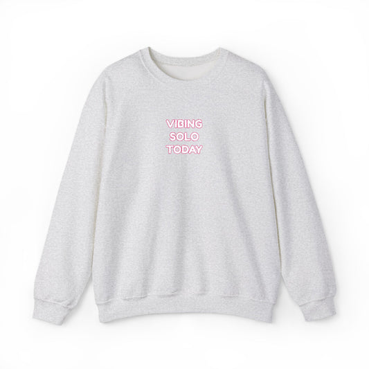 Front view of ash gray crewneck sweatshirt with pink "VIBING SOLO TODAY" embroidery on chest