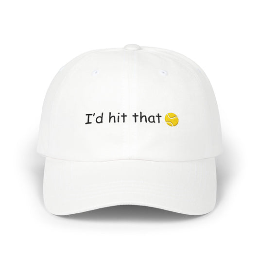 Front view of white dad hat with black "I'd hit that 🏸" embroidery and golden tennis ball emoji