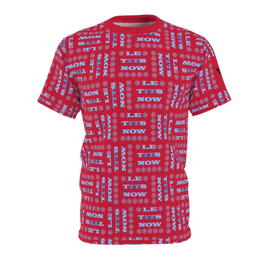 Front view of bright red all-over print tee with repeating cyan "LETitSNOW Le Tits Now" pun text and snowflakes