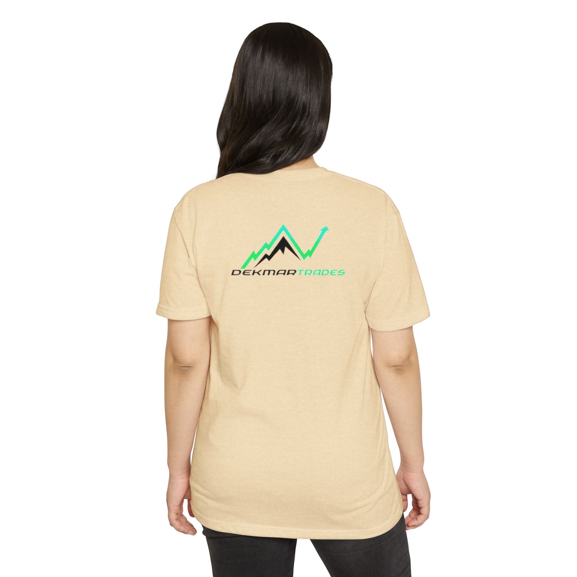 Female model back view in beige CVC t-shirt with green/black "Dekmar Trades" peaks and arrow