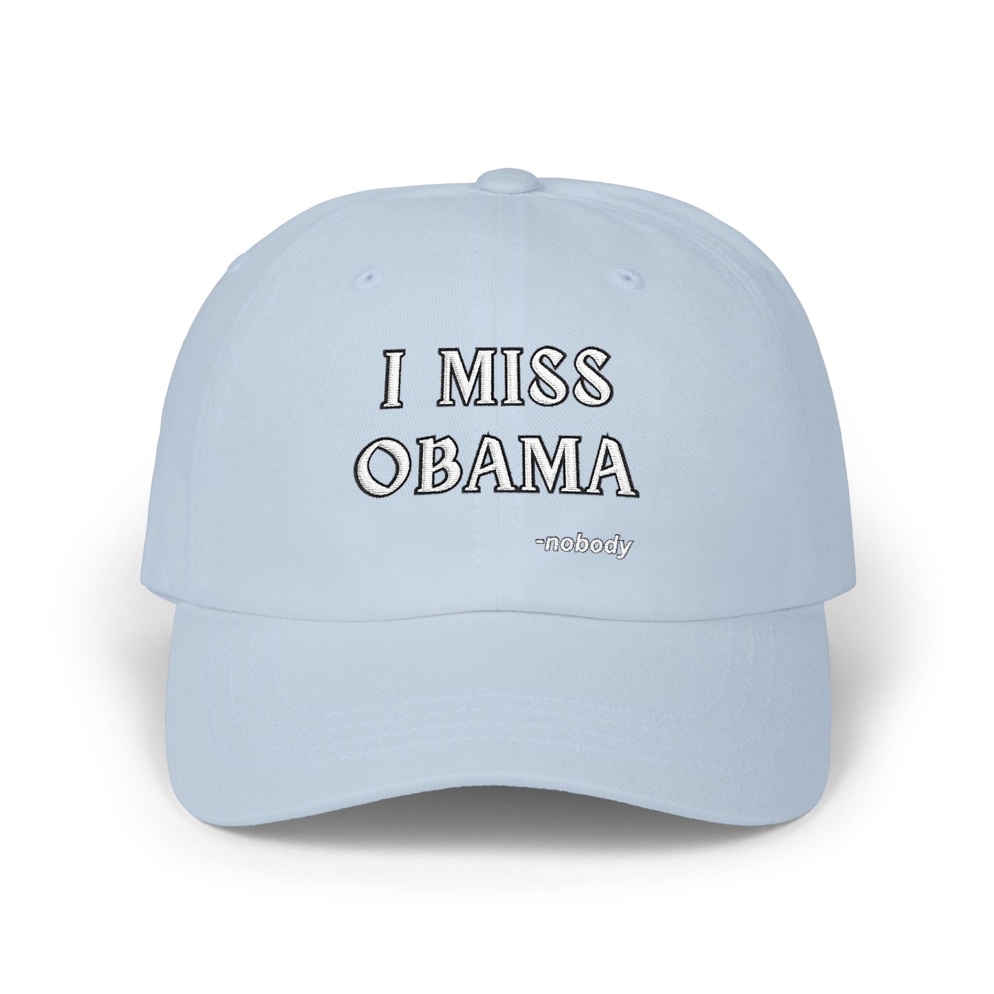 Front view of light blue dad hat with "I MISS OBAMA -nobody" in contrasting embroidery