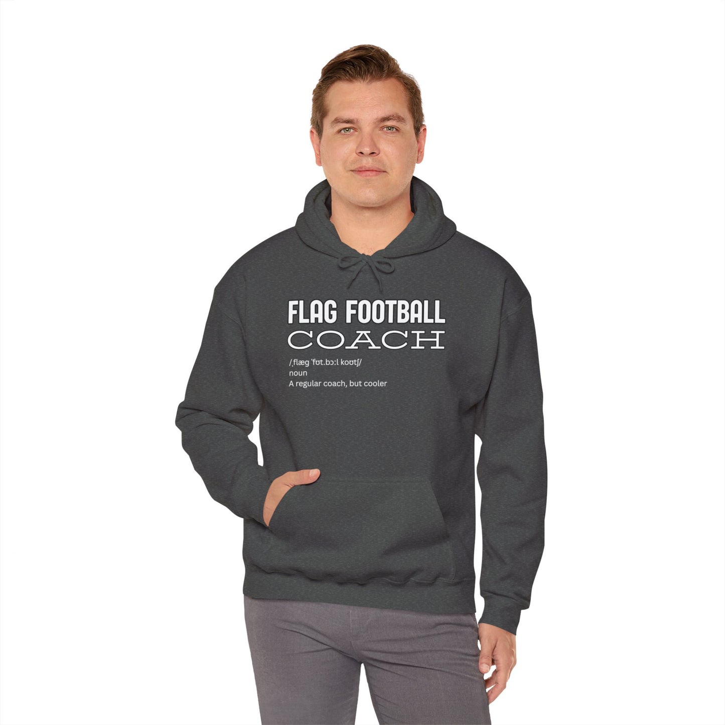 Male model in heather gray pullover hoodie, front view showing "Flag Football Coach: like a regular coach but cooler" print