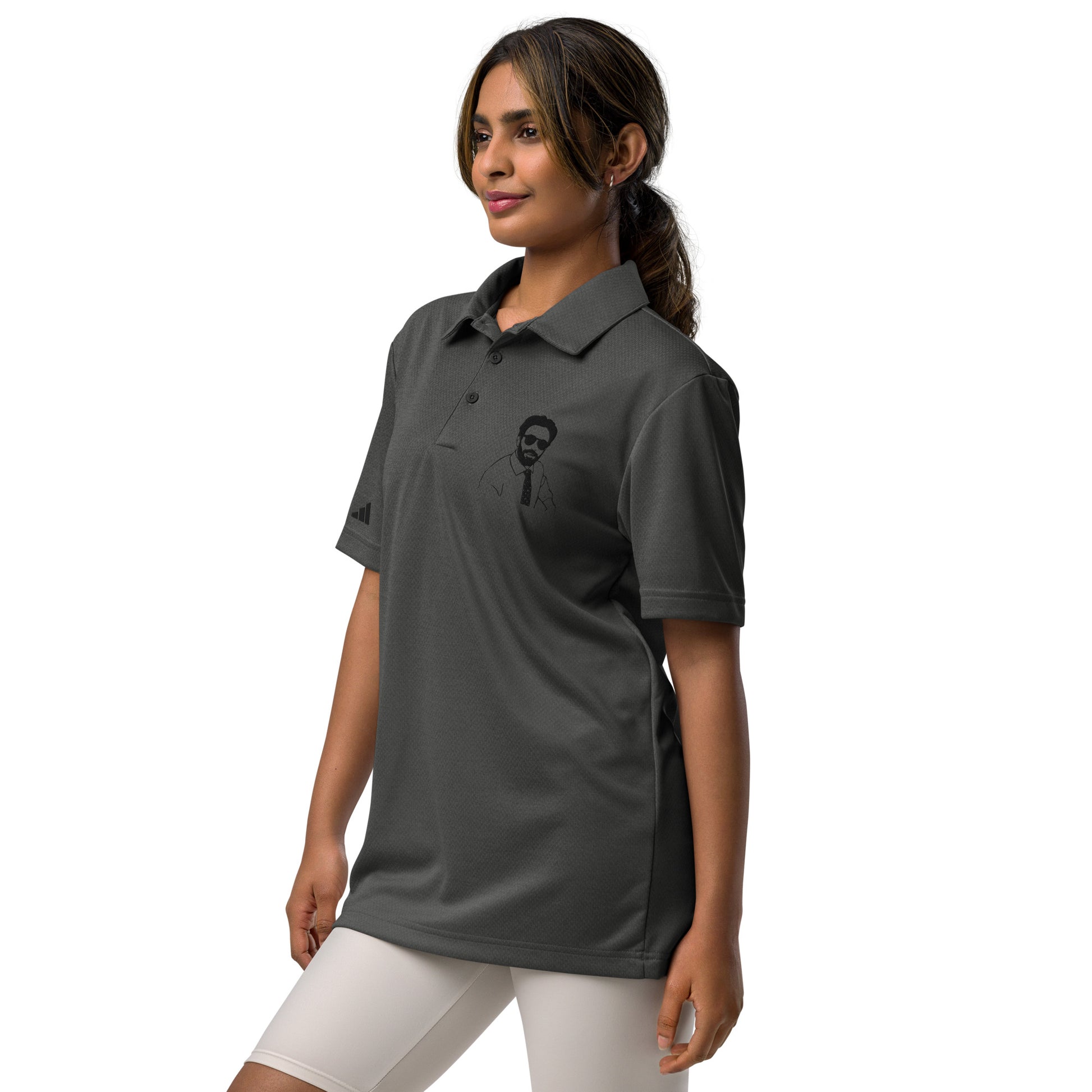Side view of woman in grey heather Adidas polo showing Burry embroidery, paired with white shorts, ponytail vibes