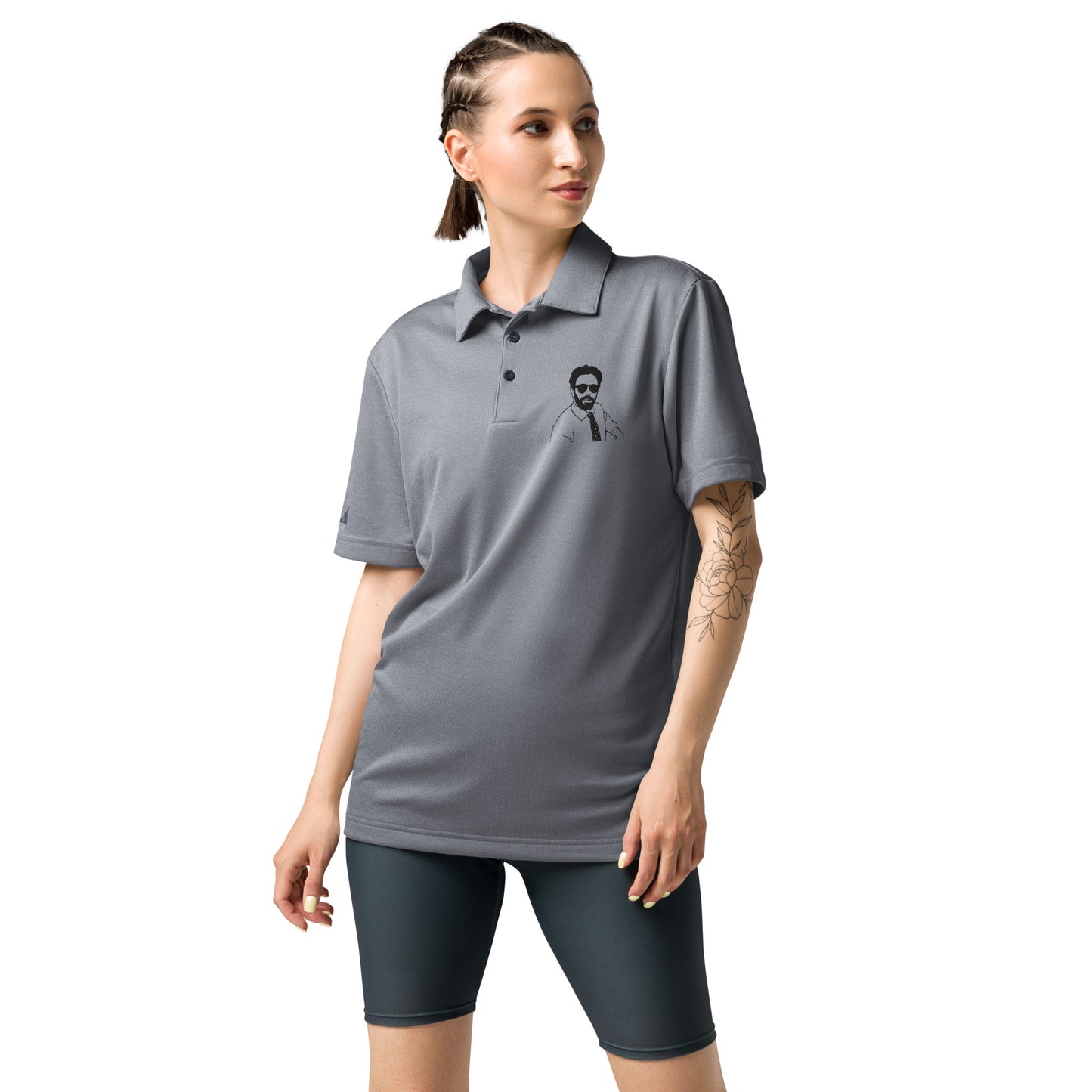 Close side angle on braided model in grey heather Burry polo, tattoo peeking, sleek adidas fit