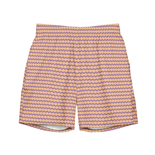 Front flat lay of peach swim trunks with all-over purple "sus" zigzag print, elastic waistband folded to show white liner