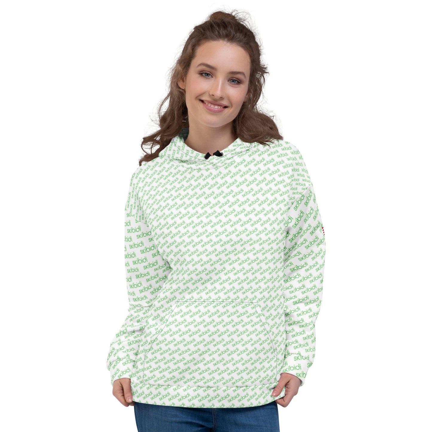 Woman smiling in front-view white unisex hoodie with green "skibidi" all-over pattern and hood up