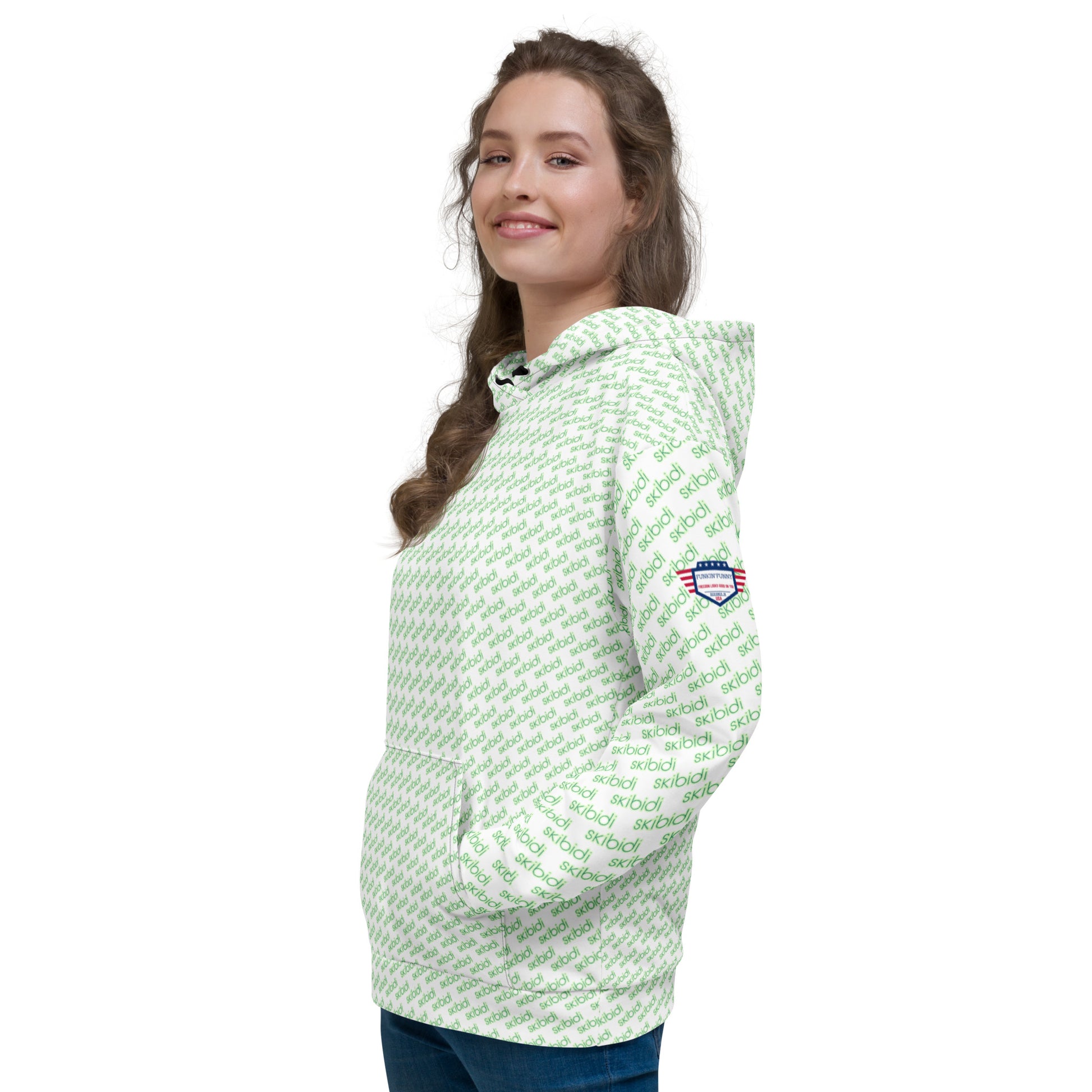 Woman modeling side view of white skibidi-patterned unisex hoodie with green text and flag patch
