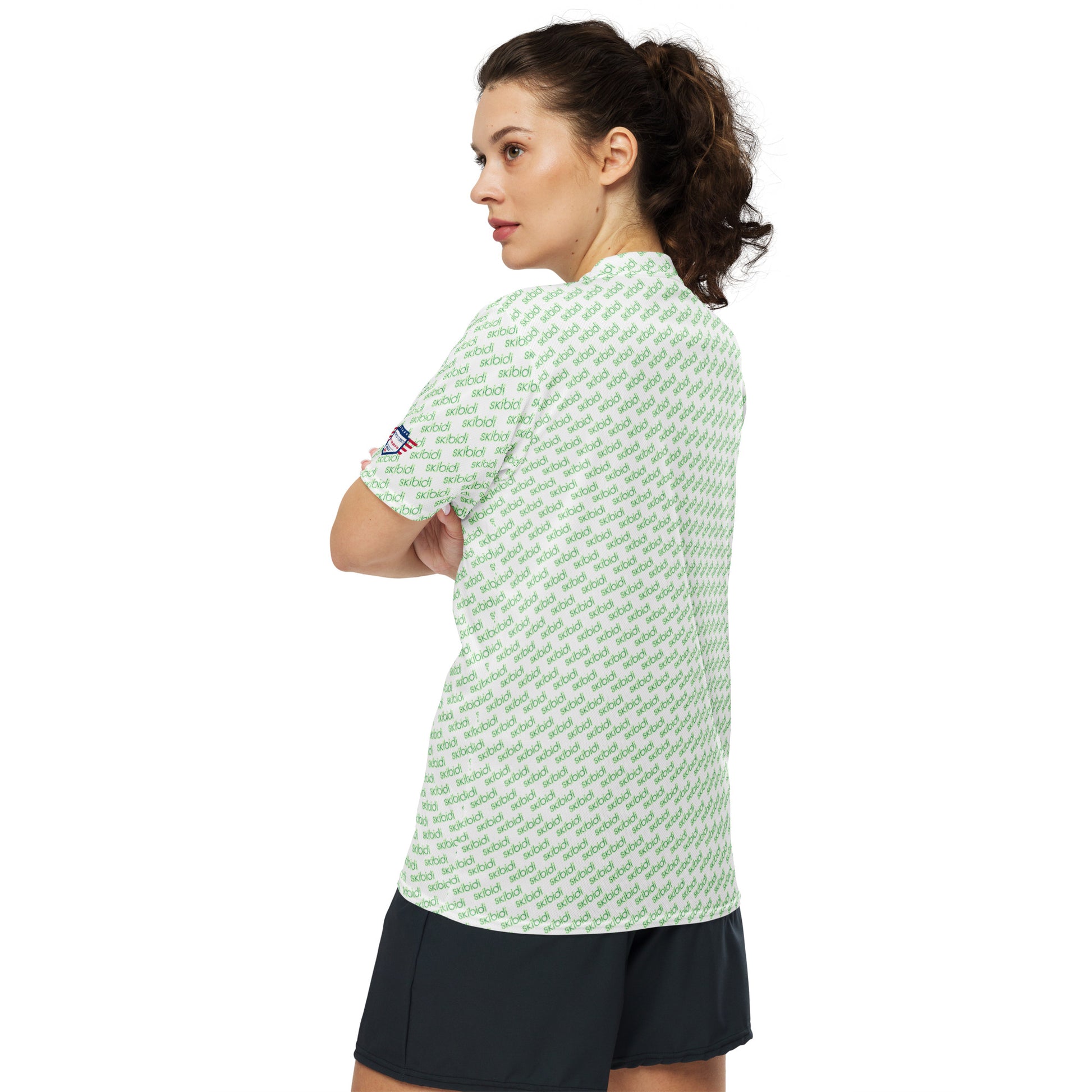 Side-back view of female model in white "skibidi" print v-neck jersey, ponytail, black shorts