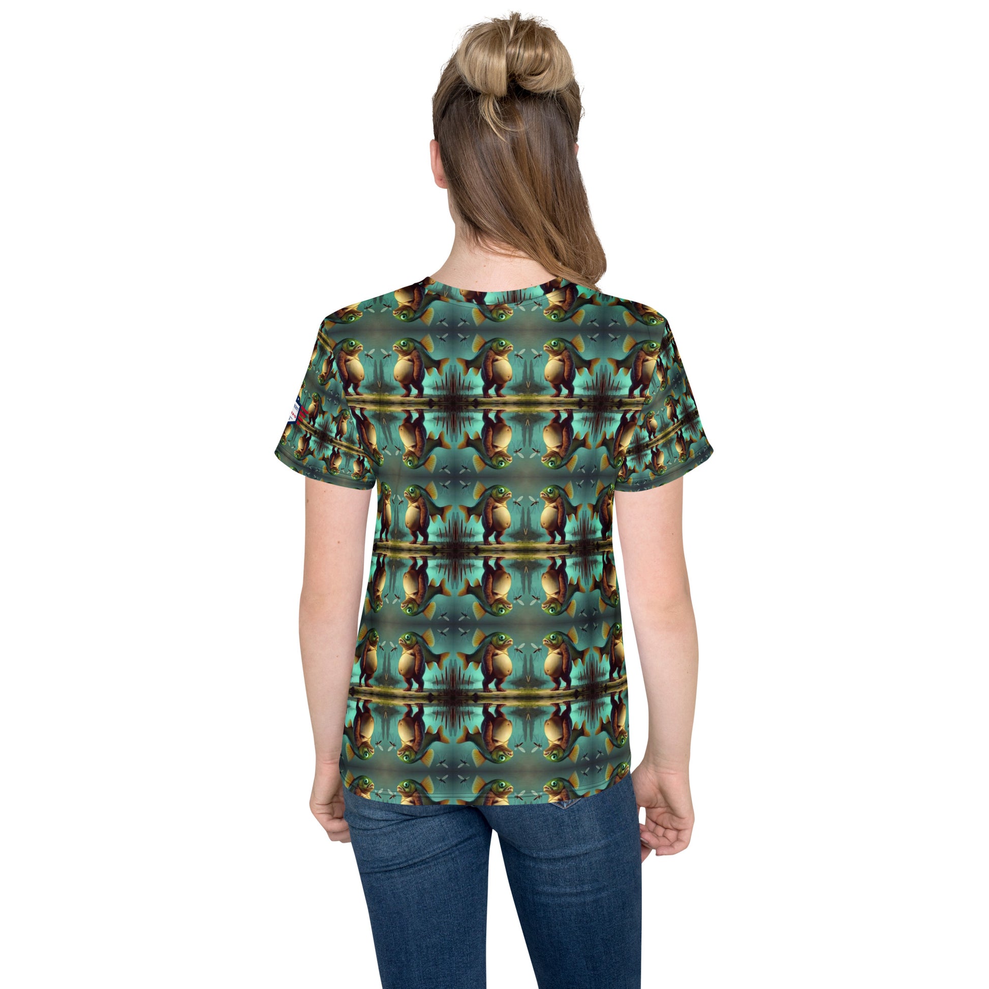 Back view of tween girl rocking Trippi Troppi youth crew tee, hypnotic teal tiger print covering every inch