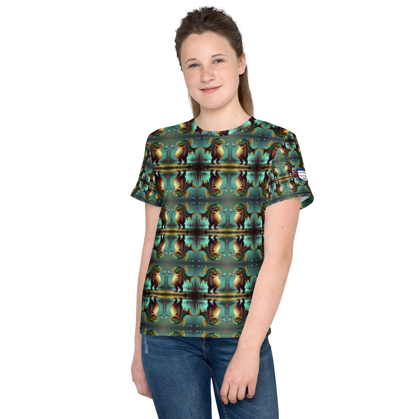 Front view of tween girl in Trippi Troppi youth crew neck tee, all-over teal-gold tiger pattern twisting wildly