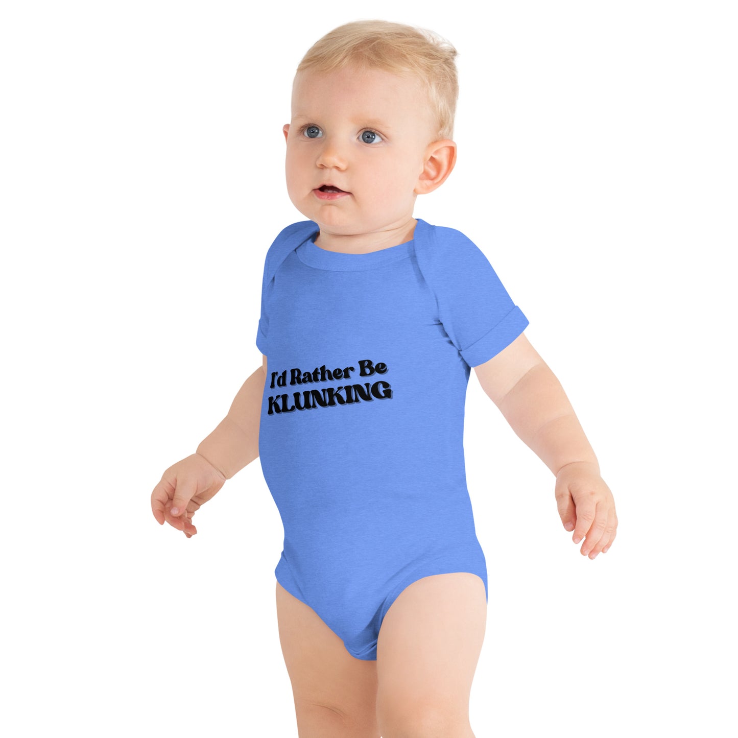 Side view of baby strutting in light blue "I’d Rather Be KLUNKING" short sleeve onesie