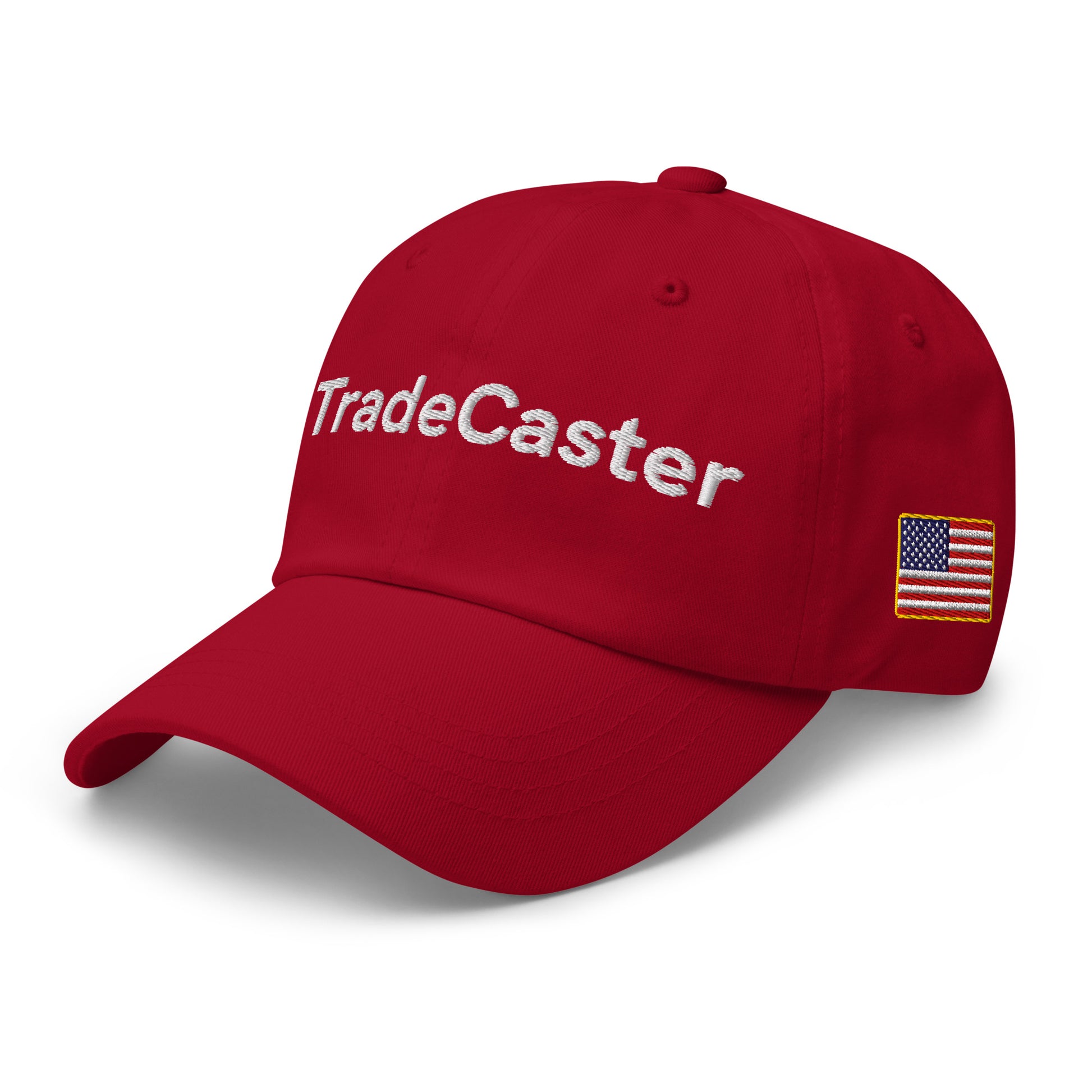 Angled front-right of cranberry red TradeCaster hat, white embroidery and US flag patch visible