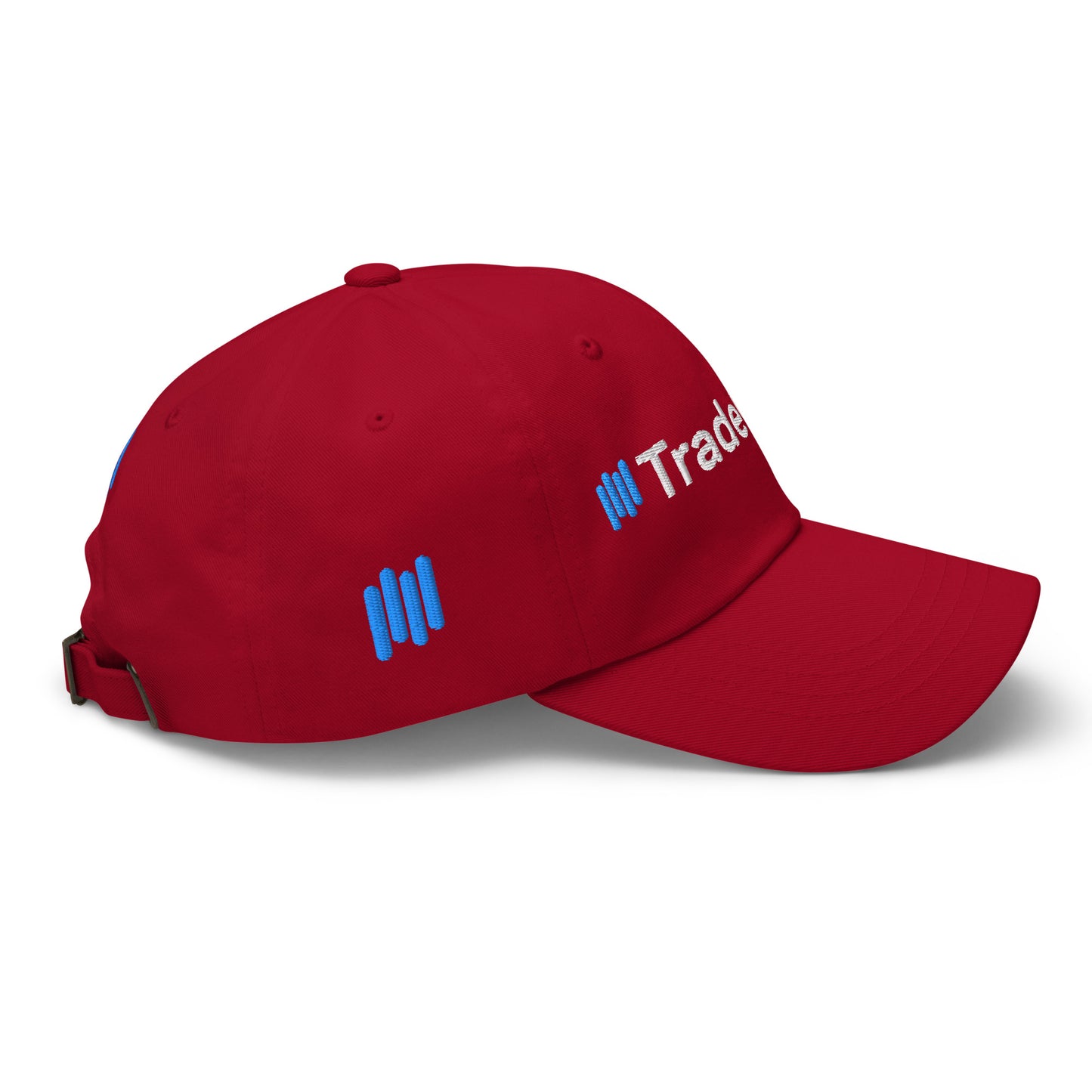 Right side view of cranberry red hat showing partial blue "||Trade" embroidery