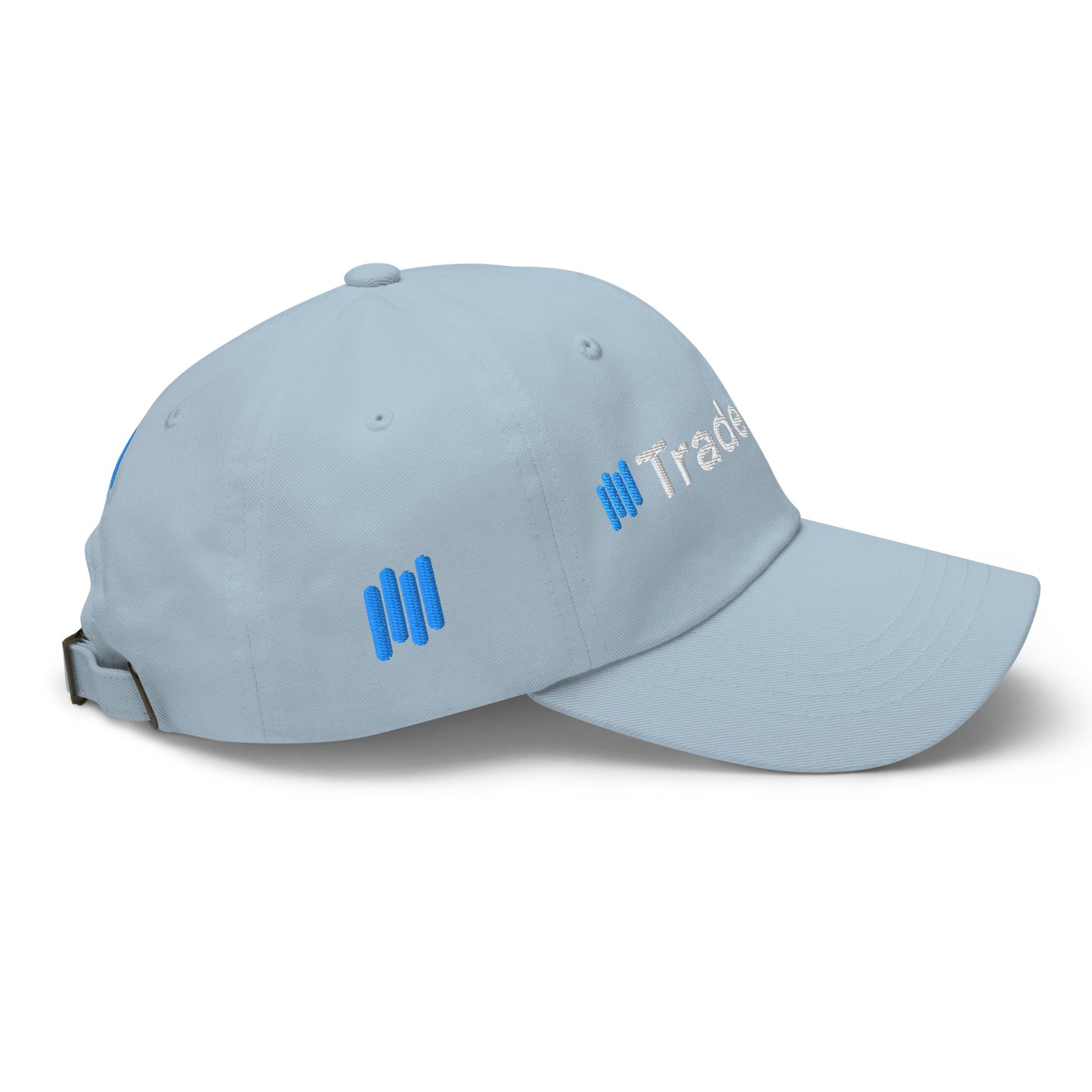 Right side view of light blue dad hat showing partial white "Trade" embroidery and blue bars