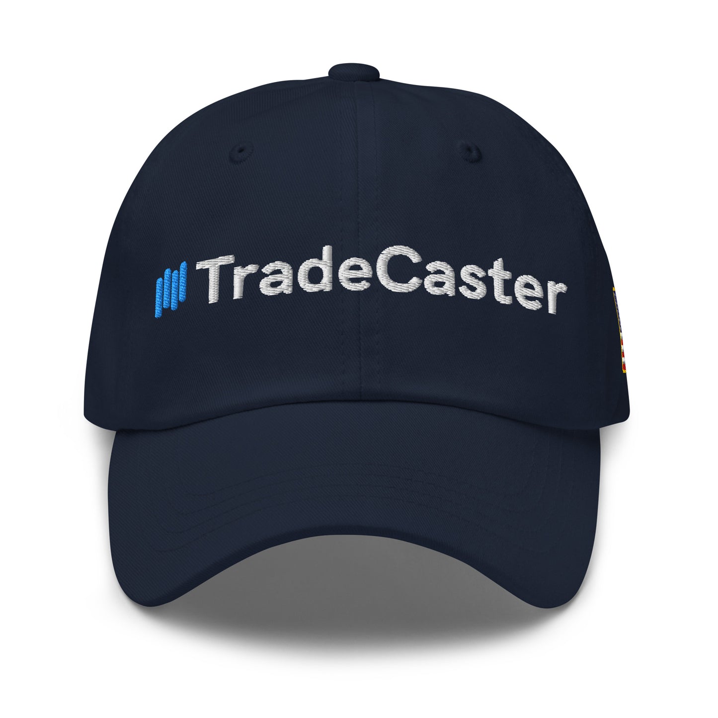Front view of navy blue unstructured cap with blue bars and white "TradeCaster" embroidery