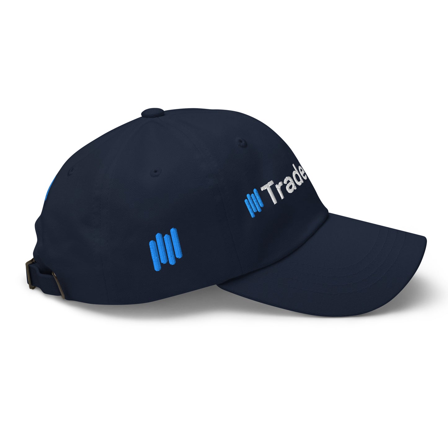 Right side view of navy dad hat showing partial blue "||Trade" embroidery