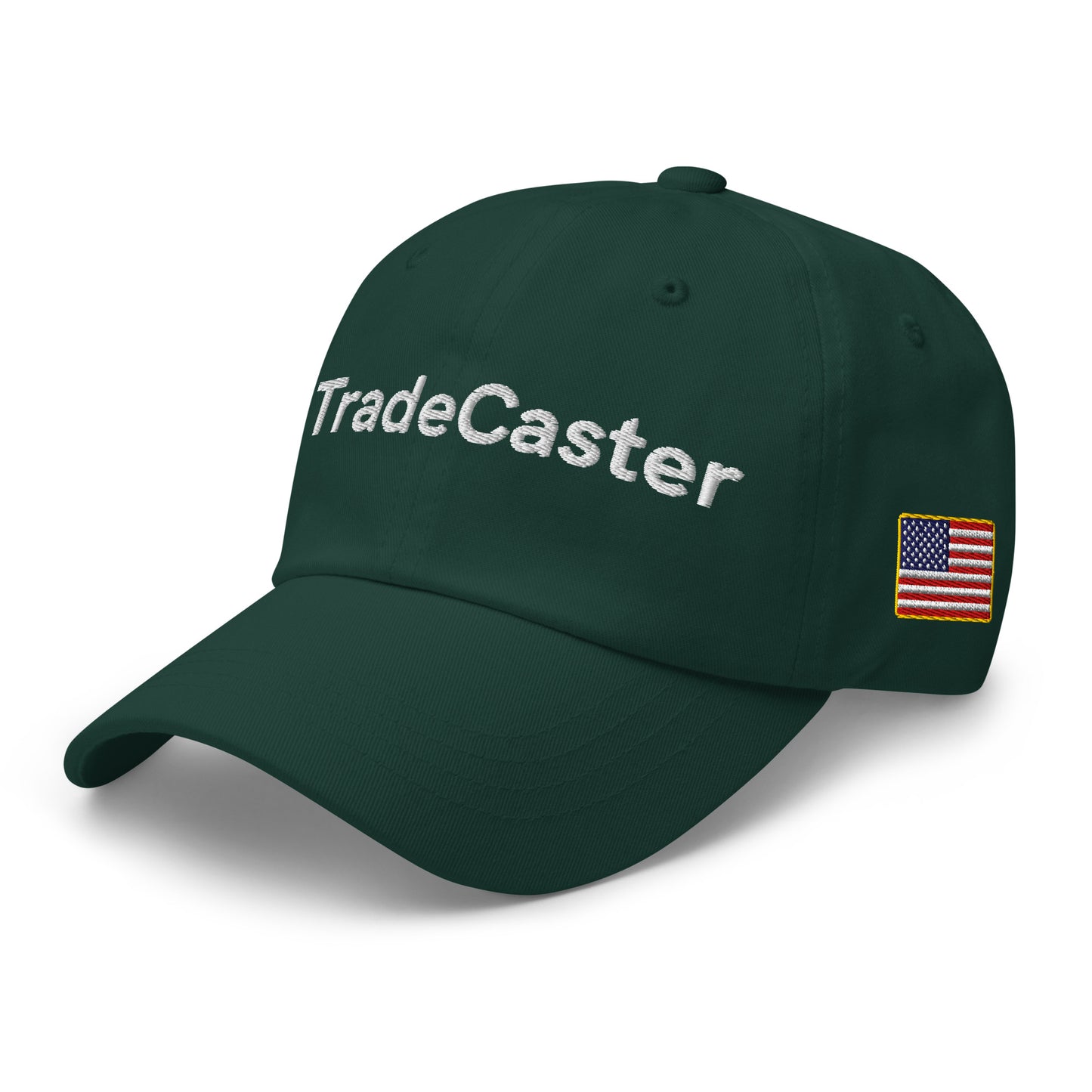 Angled front-right of spruce green TradeCaster hat, white embroidery and US flag patch visible