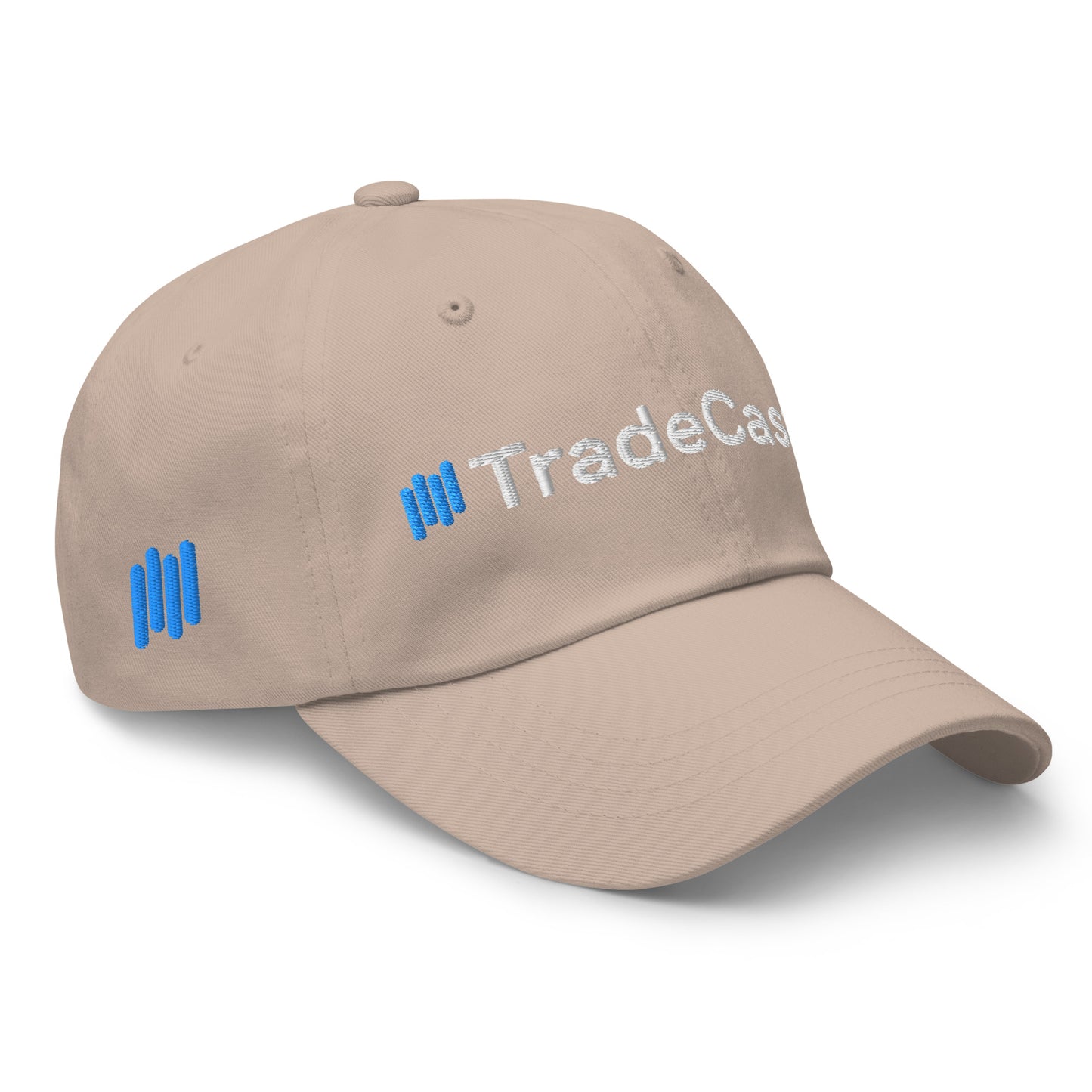 Side detail of khaki TradeCaster hat showing white "Caster" text, blue bars, flag patch