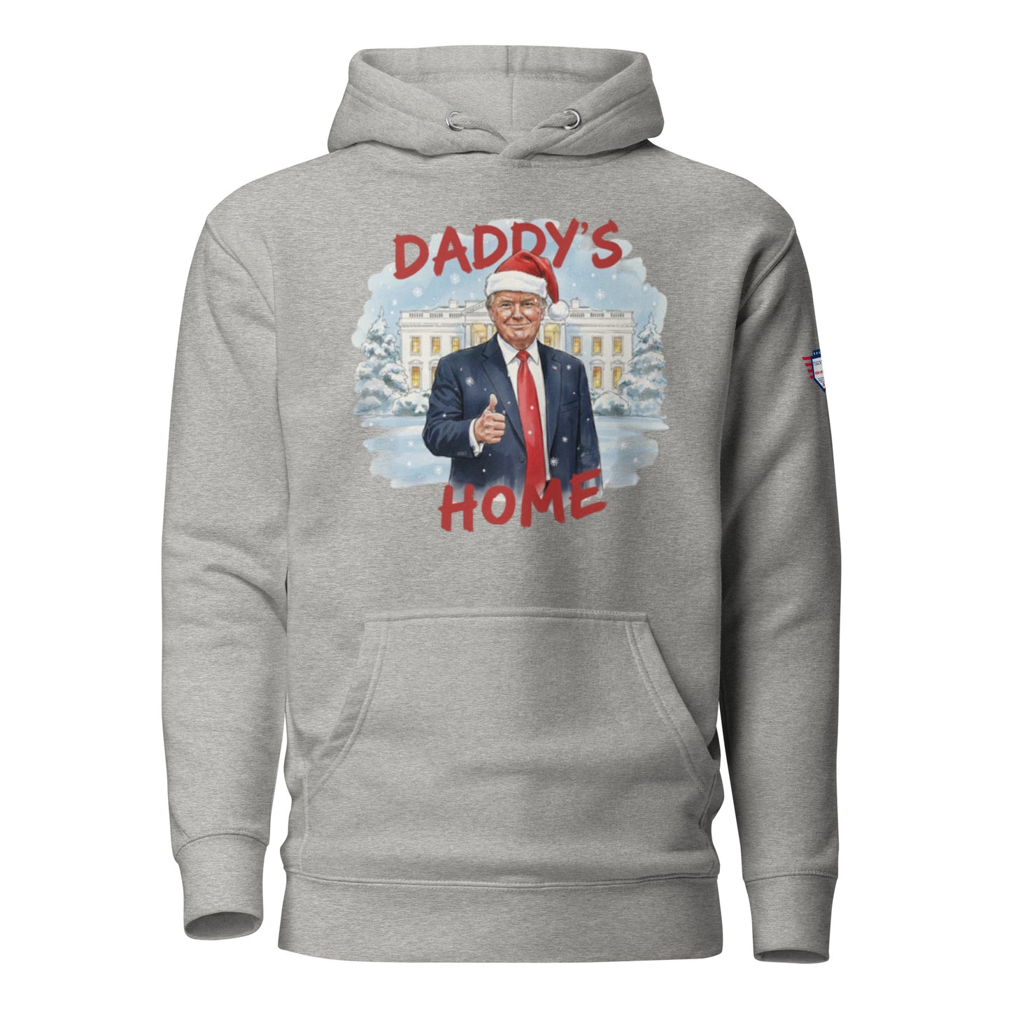 Front view of light gray "Daddy’s Home" hoodie with Santa Trump thumbs-up at snowy White House