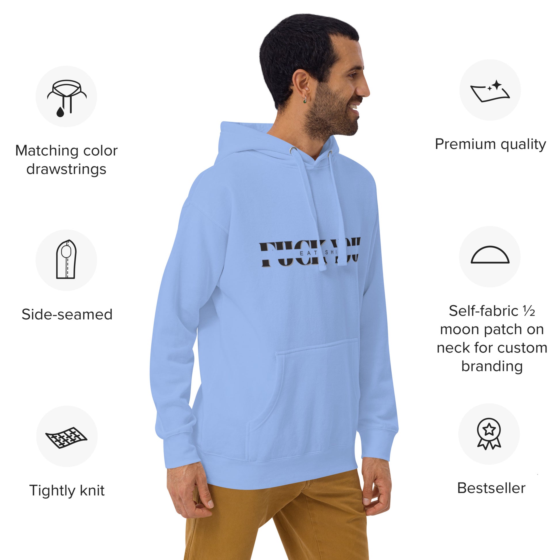Smiling male model in light blue hoodie, right-front side showing "F*ck You" text and flag patch