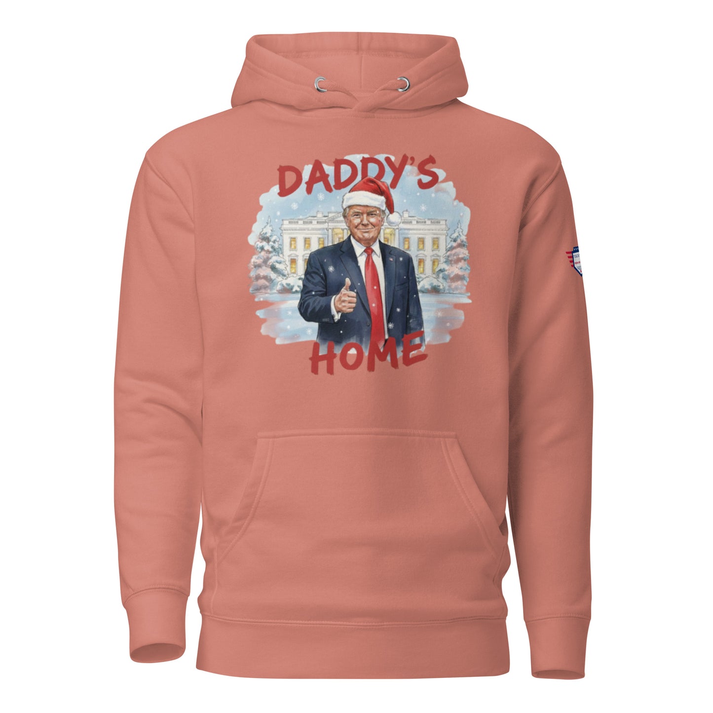 Front view of coral "Daddy’s Home" hoodie with Trump in Santa hat thumbs-up before snowy White House