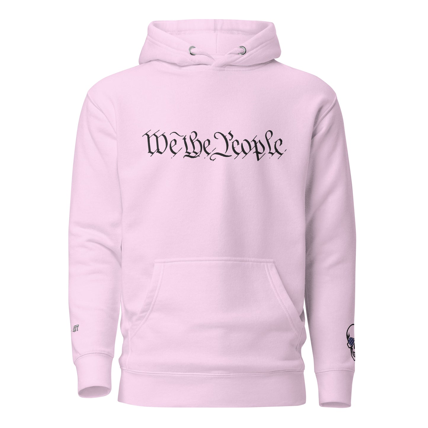 Front view of light pink unisex hoodie with arched black "We the People" embroidery across chest, skull on sleeve