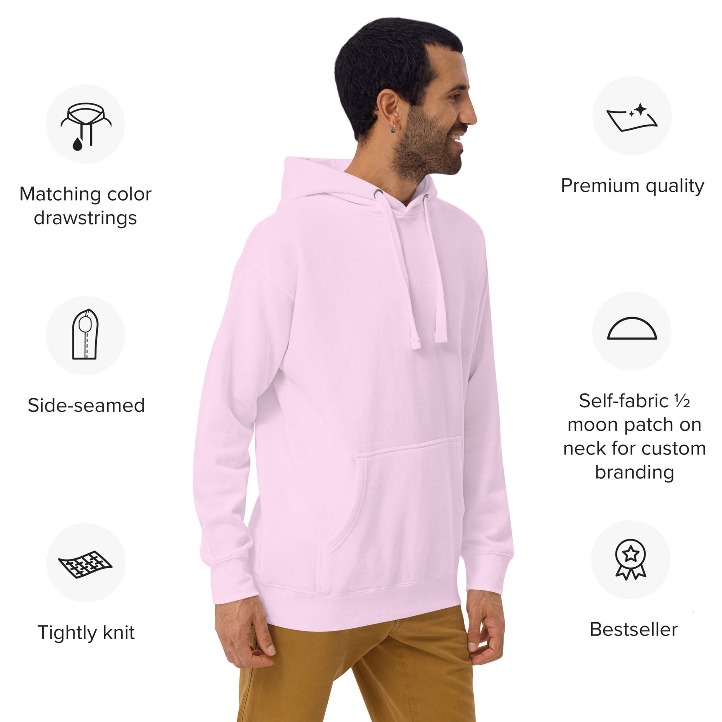 Male model in motion wearing light pink Happy Trump Hoodie from side angle, cozy fit with feature icons overlaid