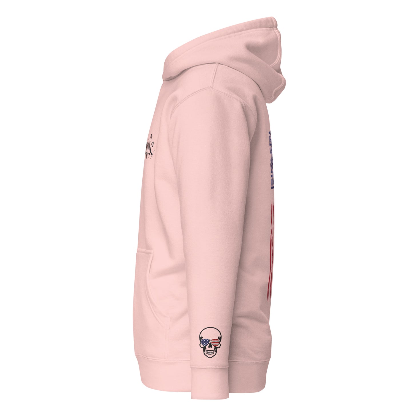 Right side view of light pink hoodie showing skull patch on sleeve, edge of flag design, pouch pocket, and cozy hood