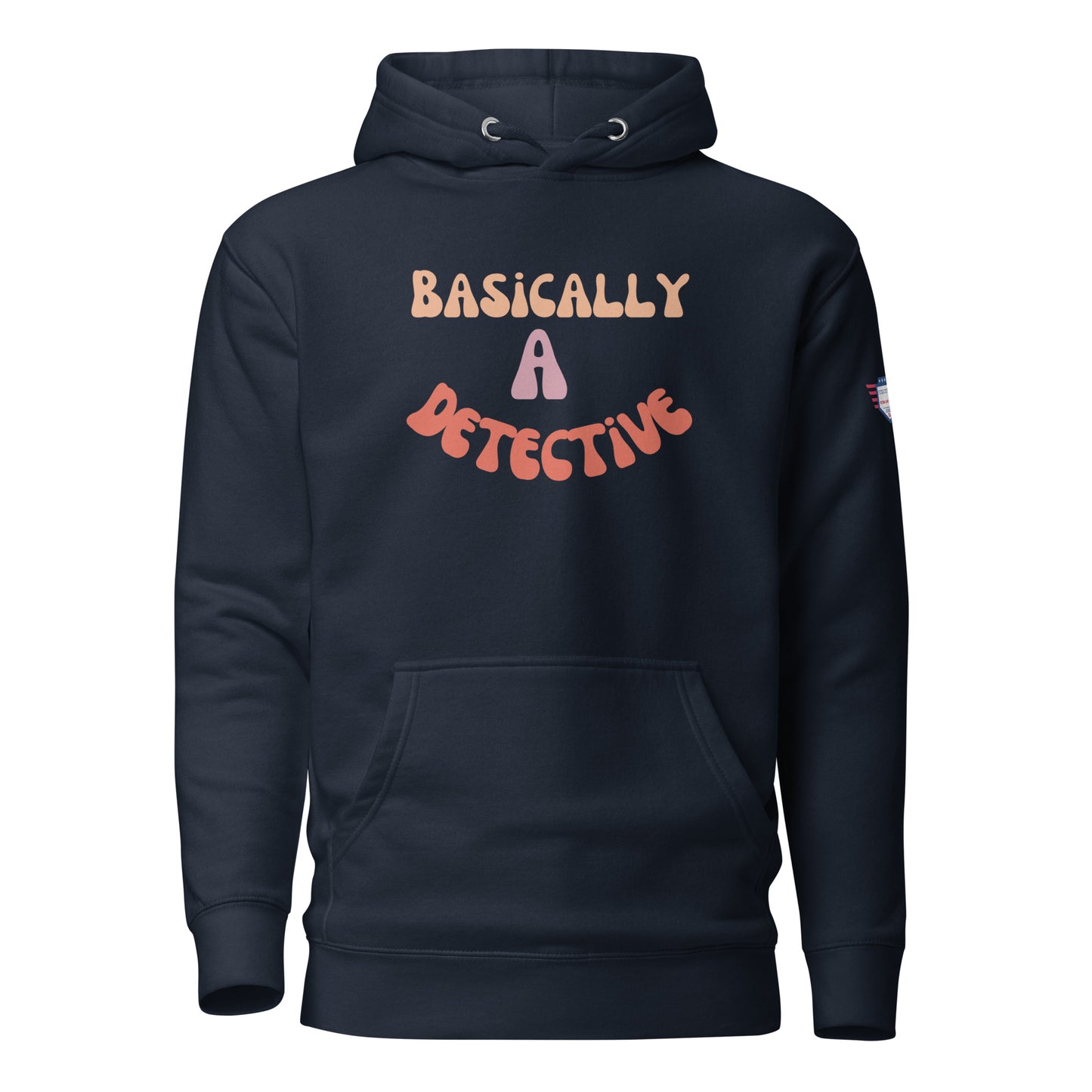 Front view of navy blue unisex Detective hoodie, "BASICALLY A DETECTIVE" in colorful wavy tan-pink-coral letters