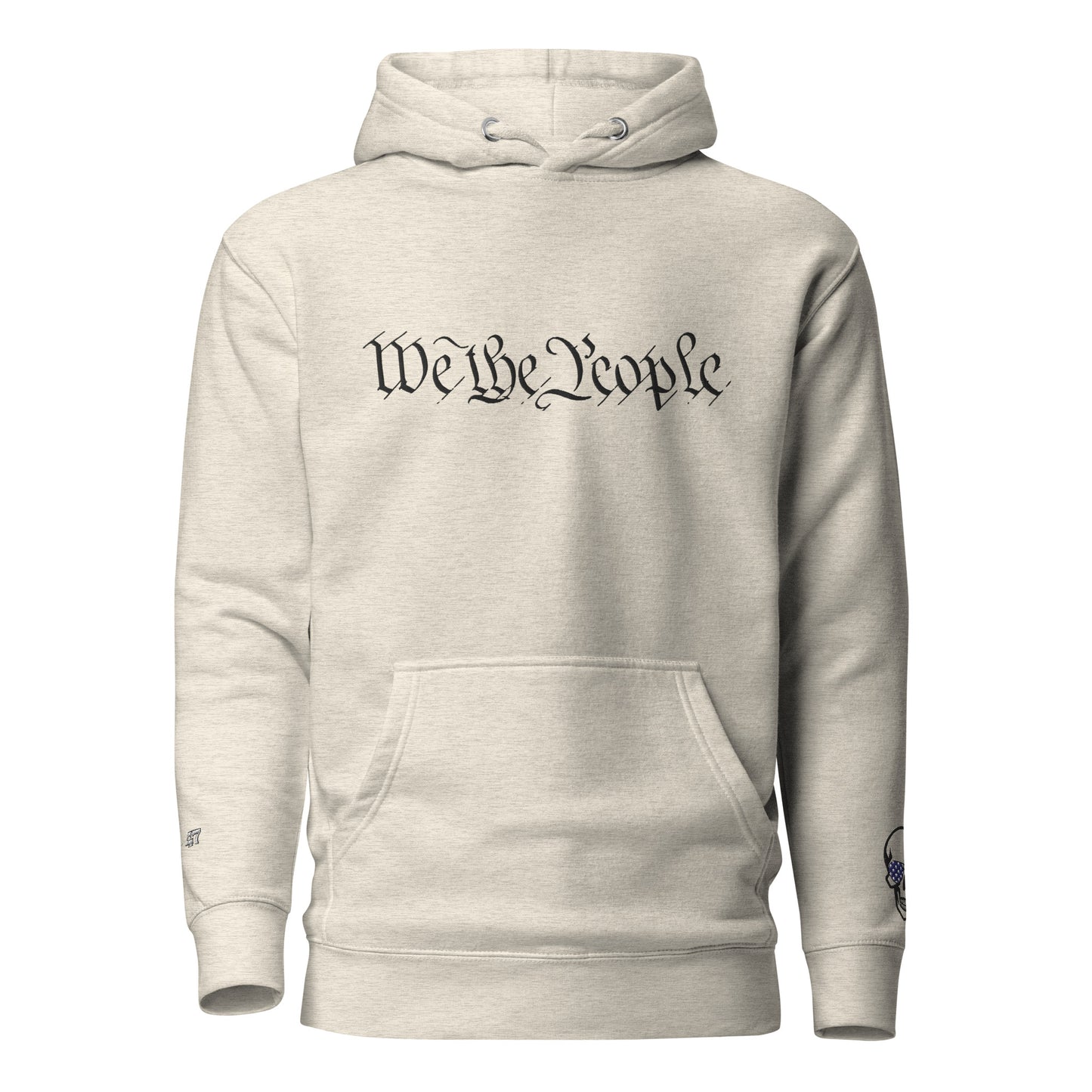 Front view of bone unisex hoodie with "We the People" embroidered chest text and skull sleeve patch
